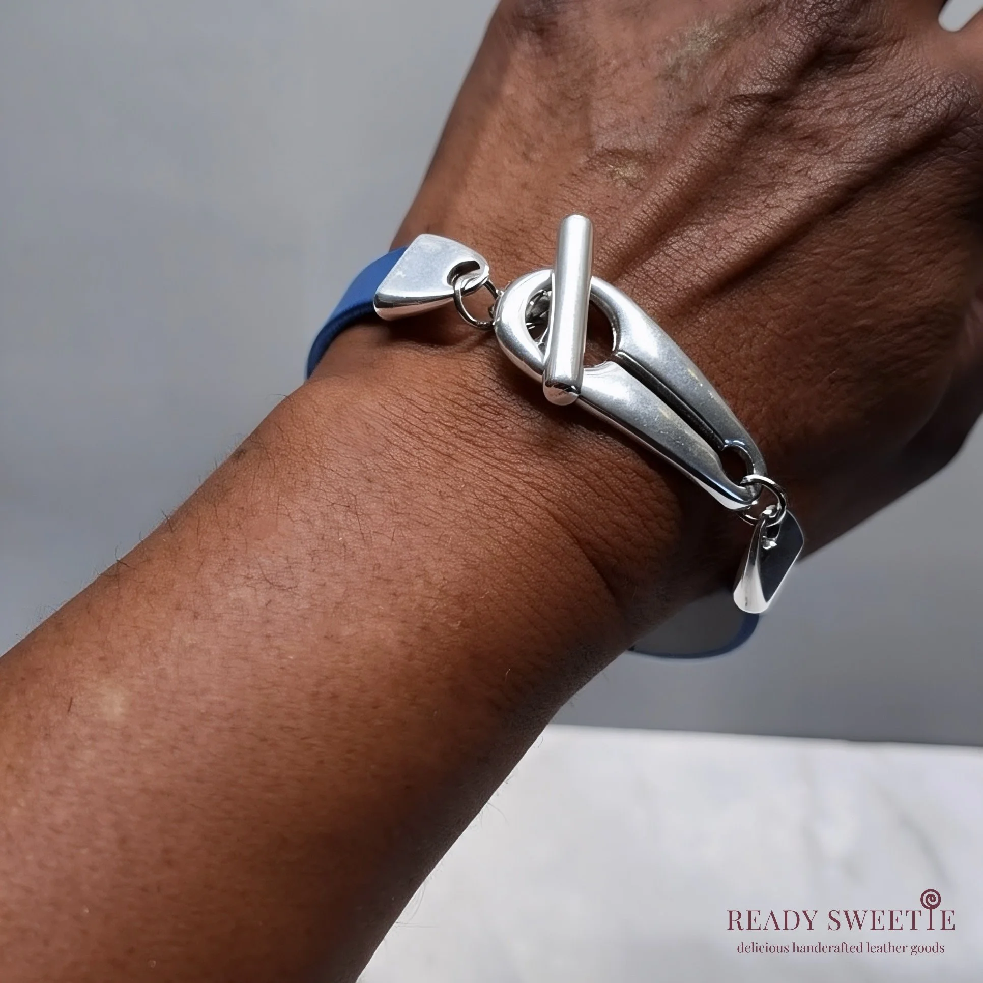 Blue_Toggle_on_wrist_darkskin_watermarked.jpg