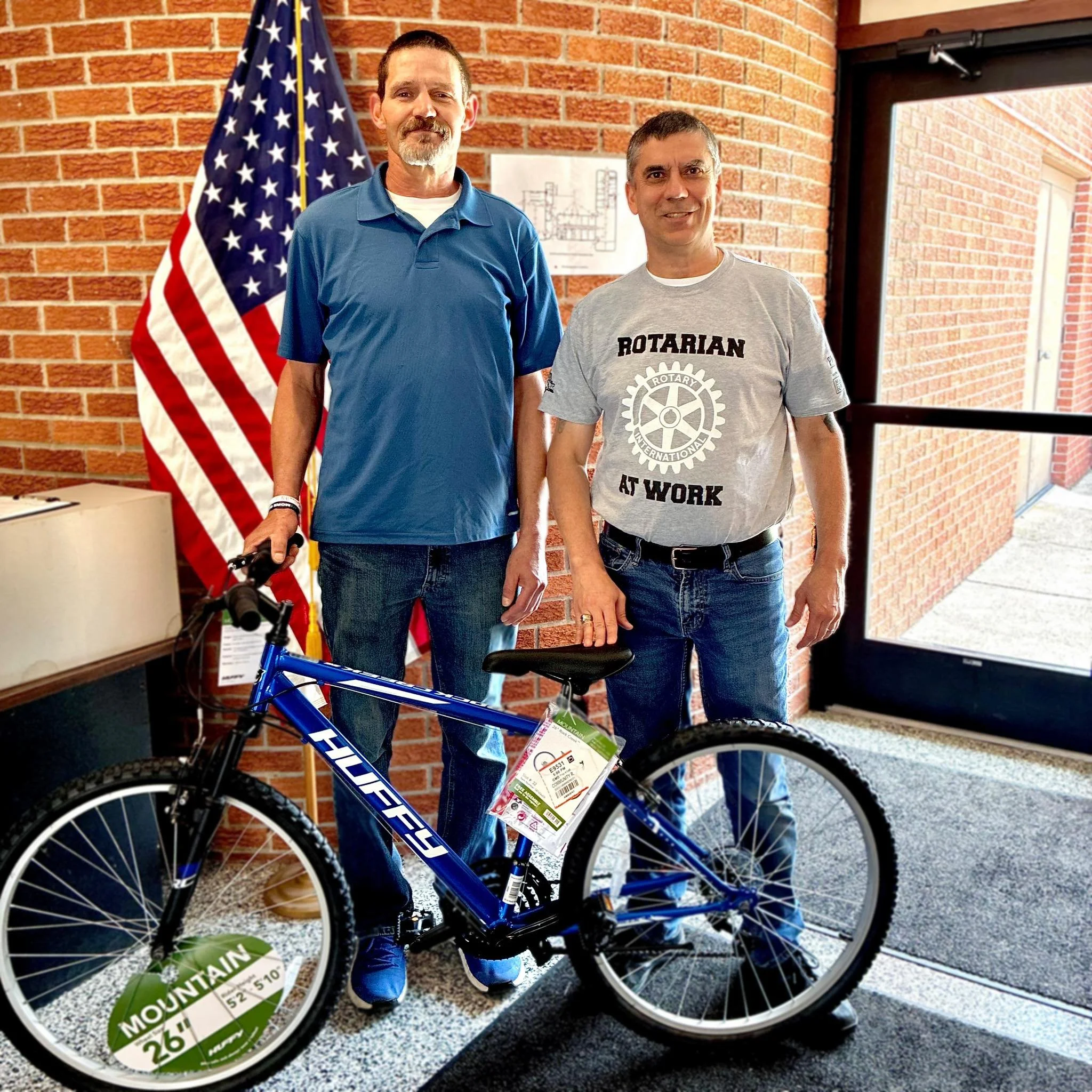 Bike Program recipient with CRC Director Chris Joannides