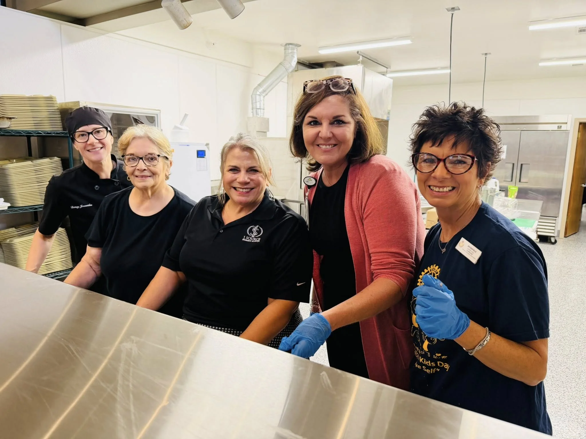 Kitchen volunteers with Chef Betsey