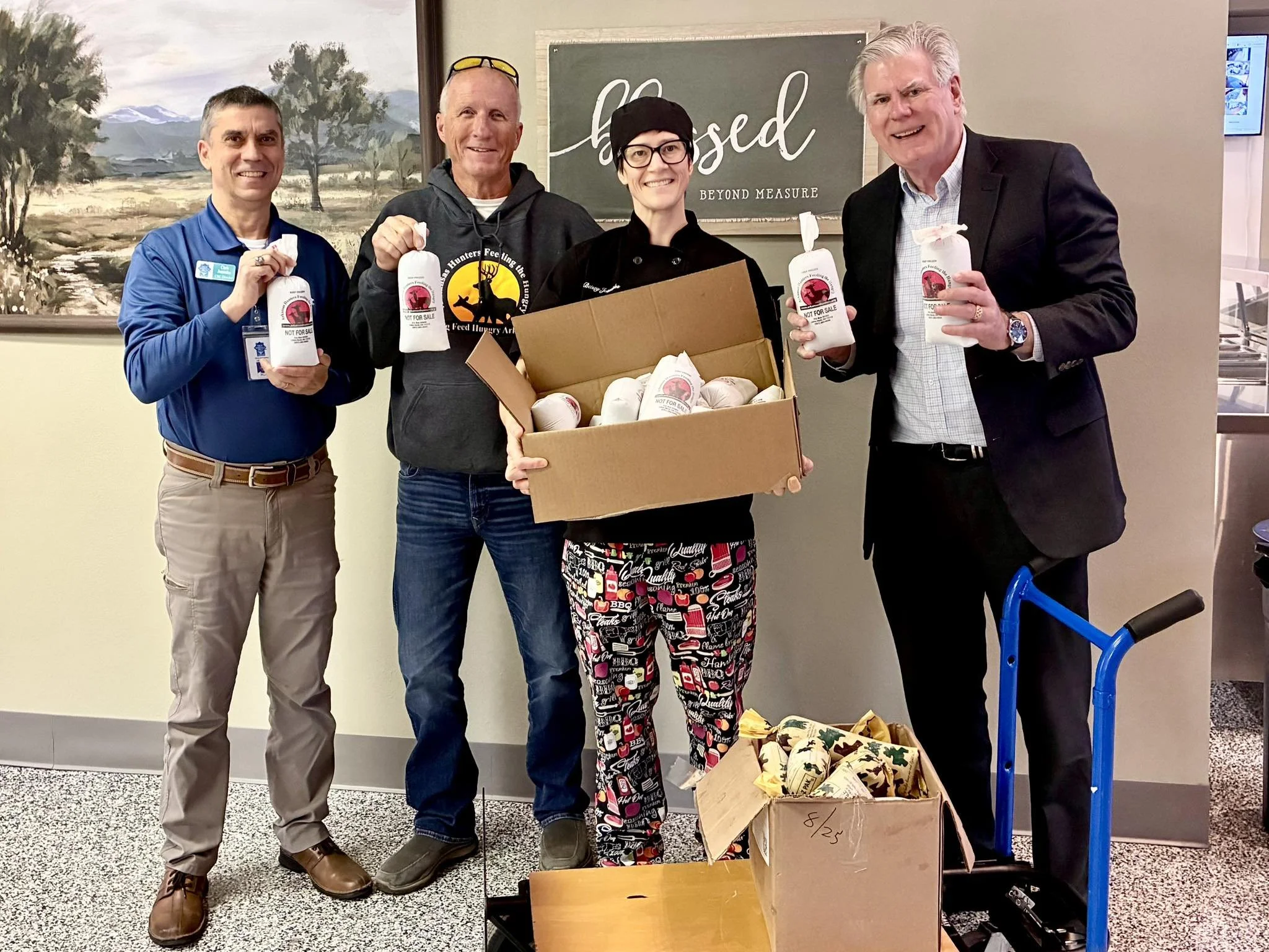 Arkansas Hunters for the Hungry donates to the CRC, Director Chris, Chef Betsey, and Mayor Pat McCabe