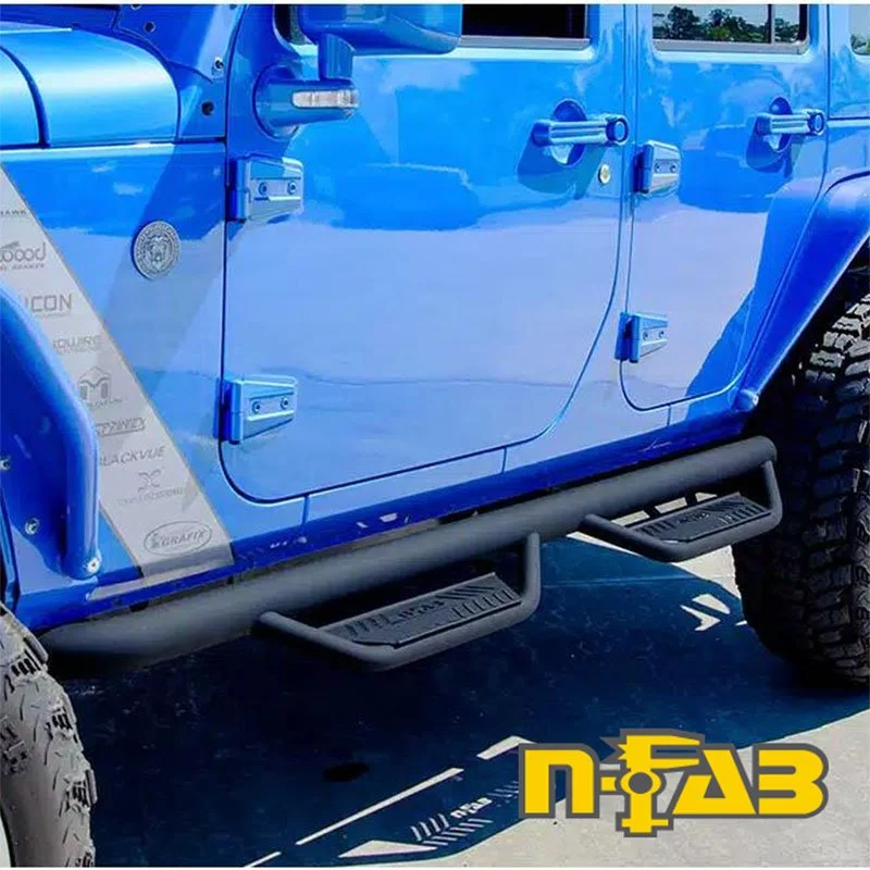 Close-up of a bright blue off-road vehicle door with multiple external hinges and a black running board underneath.
