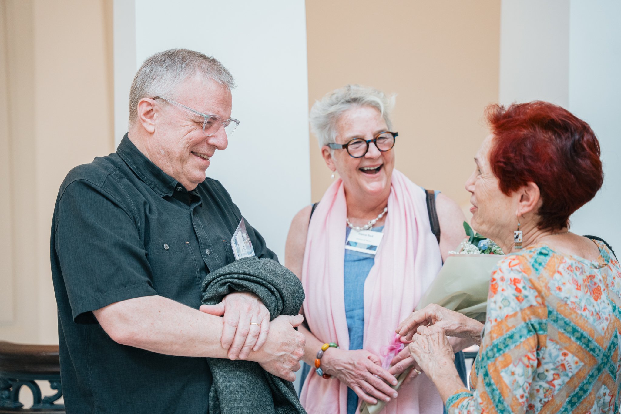 Narrator Marcia Rock celebrating with friends and family at the opening reception.

Photo by Cindy Centeno