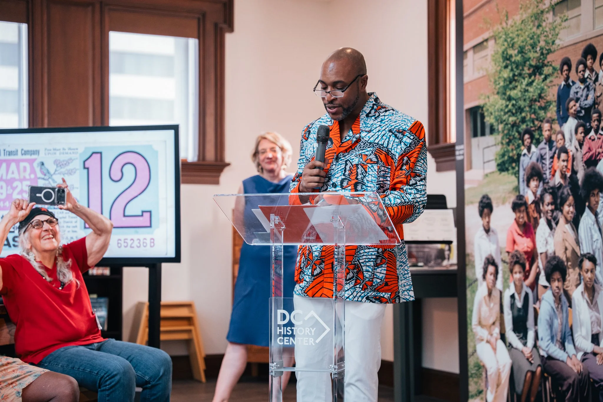 Aaron Myers, Executive Director of the DC Commission on the Arts and Humanities, speaking to the opening event crowd.

Photo by Cindy Centeno