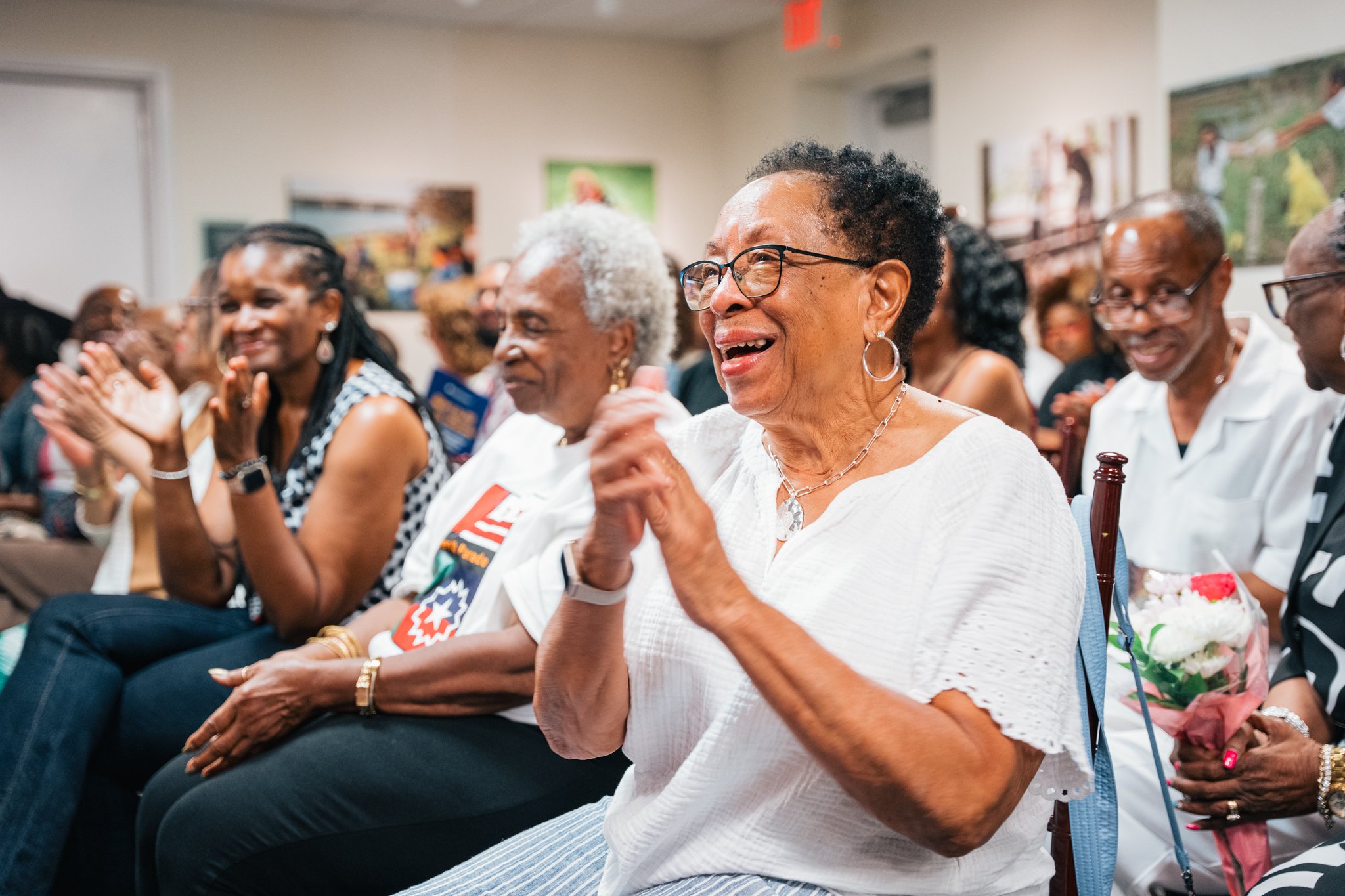 Audience members clap for Verbal Gymnastics performers at Step Into the Story event.

Photo by Cindy Centeno