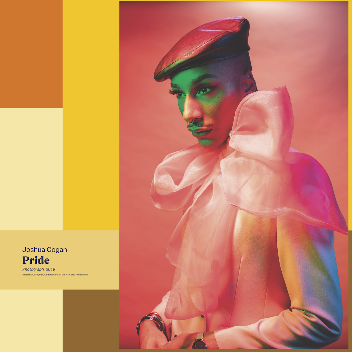 Portrait of a person wearing a large pink bow and beret over yellow and orange designs. The photo is titled Pride, by Joshua Cogan, Photograph, 2016, Art Bank Collection, Commission on the Arts and Humanities.