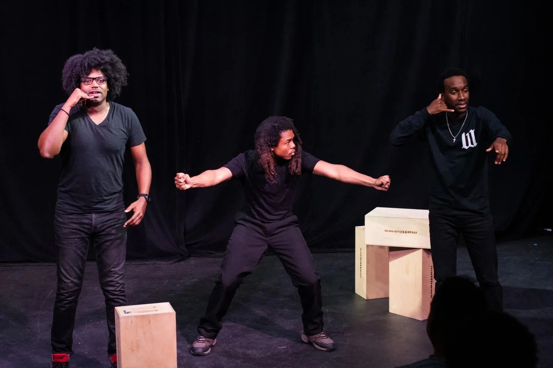 Verbal Gymnastics performers onstage during a Beyond the Archives event with HumanitiesDC