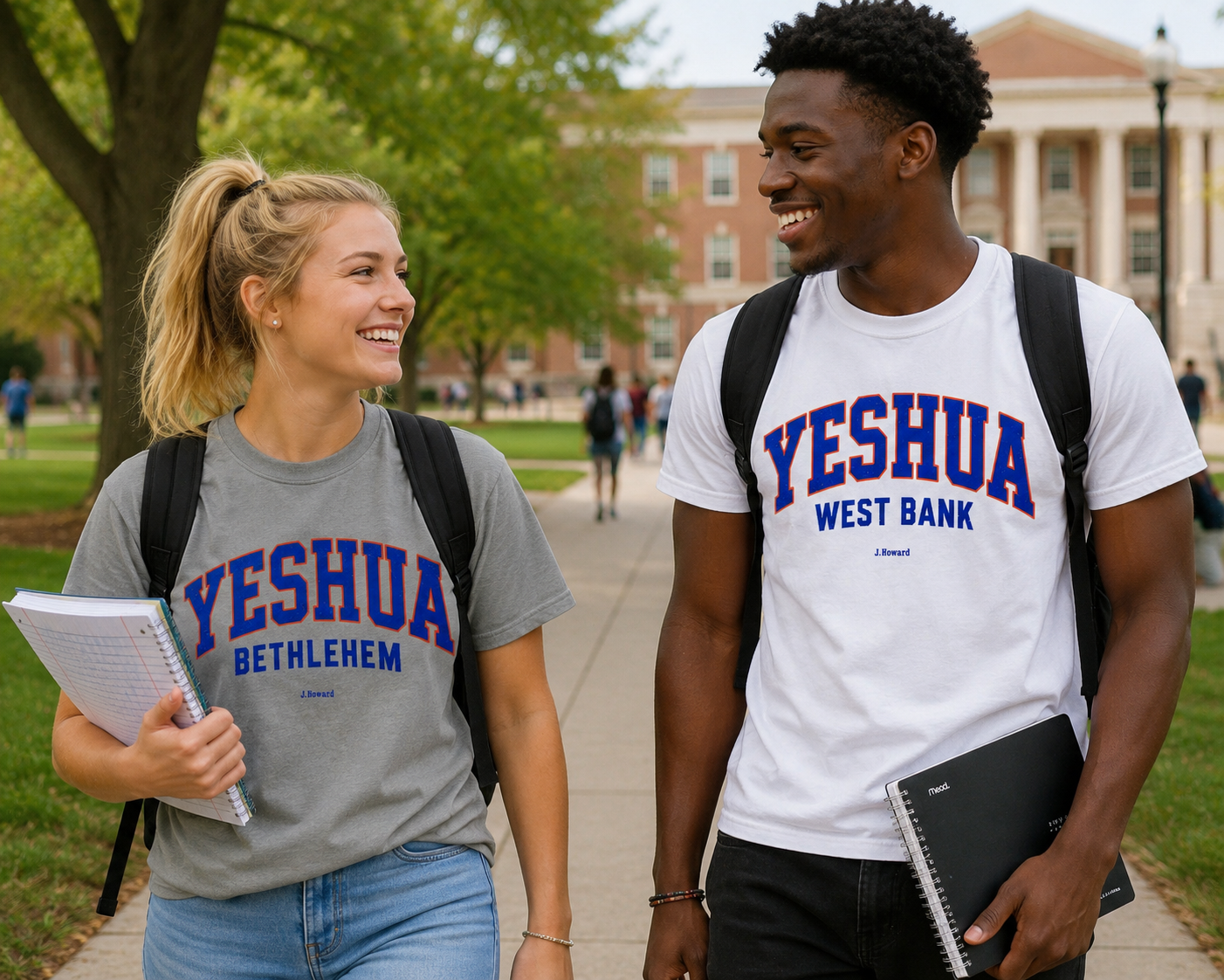 Two college students, a woman and a man, walking and talking outdoors on campus. They are smiling and carrying notebooks and backpacks. Both are wearing t-shirts with the words "YESHUA" on the front.