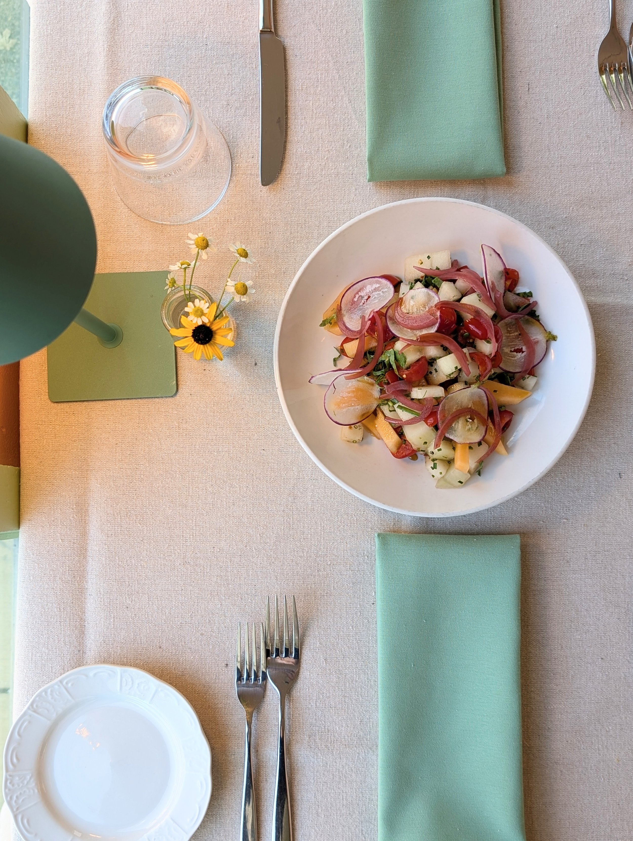 Fresh, local, melon salad for the warm summer months. Shaved biodynamically grown radish garnish this salad and it's gluten free, vegan, and dairy free.