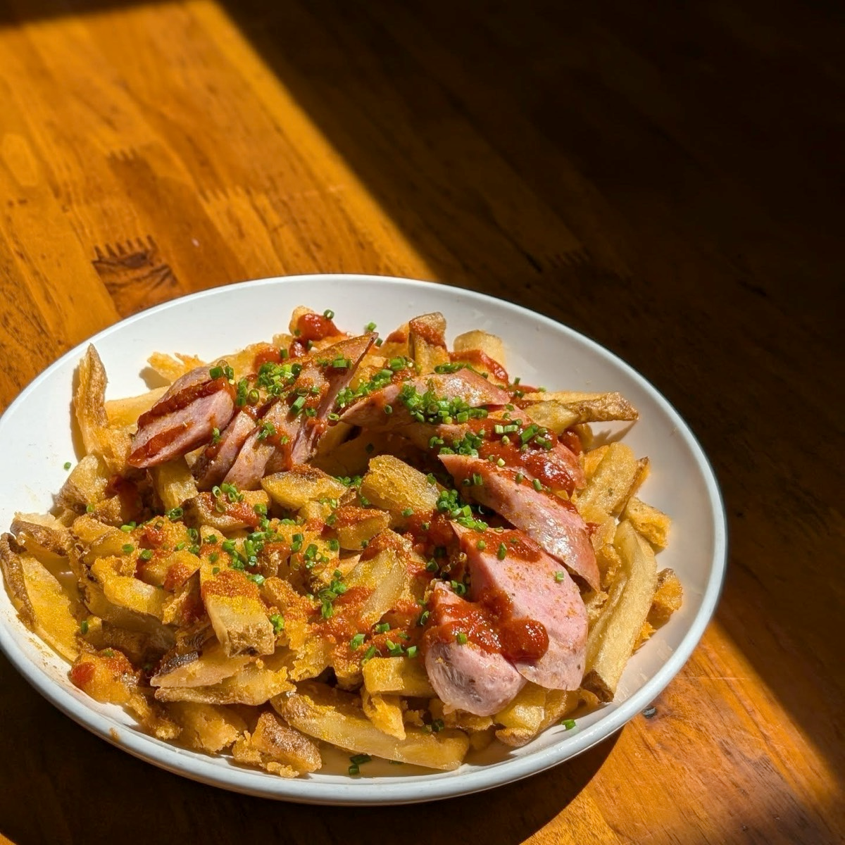Currywurst is a staple in German cuisine. House made sausage and bratwurst is always on the menu at Nous, showcasing the authentic German side of Alsatian cuisine.