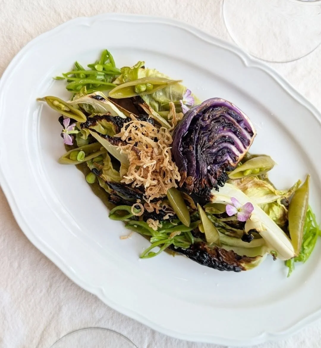 Vegan and gluten free dishes are always on the brunch and dinner menus. This one features local, biodynamic cabbage, seasonal snap peas, and a sauce brimming with flavor.