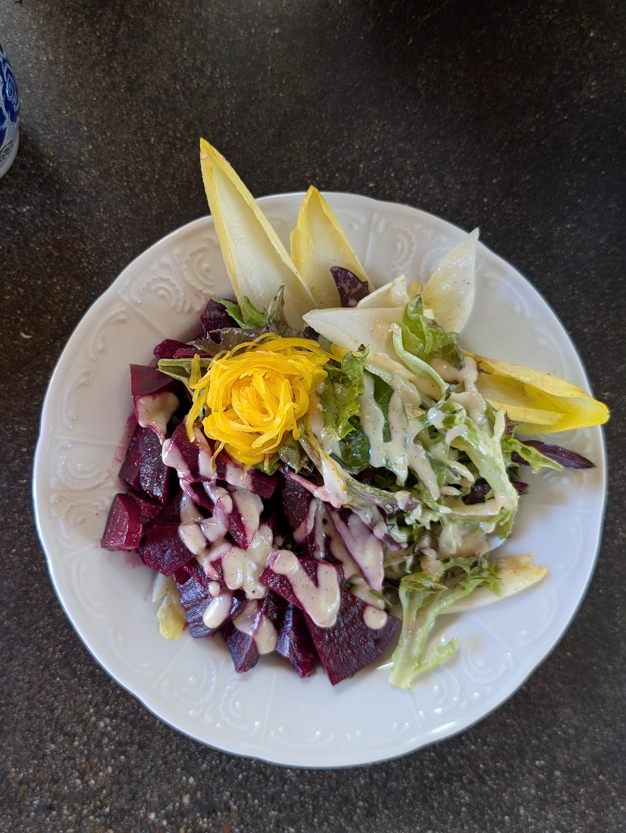 Fresh, seasonal endive salad is a perfect treat for the open air patio. Local beet, organic produce, and bright lemon make this salad wonderful.