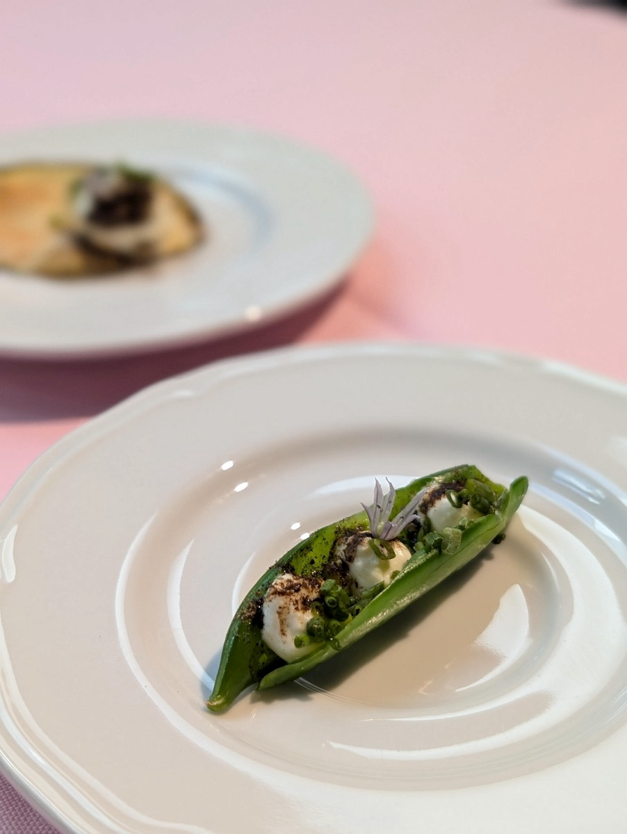 An Amuse Bouche in the classic French style: this one features a sustainably sourced snap pea and local ingredients.