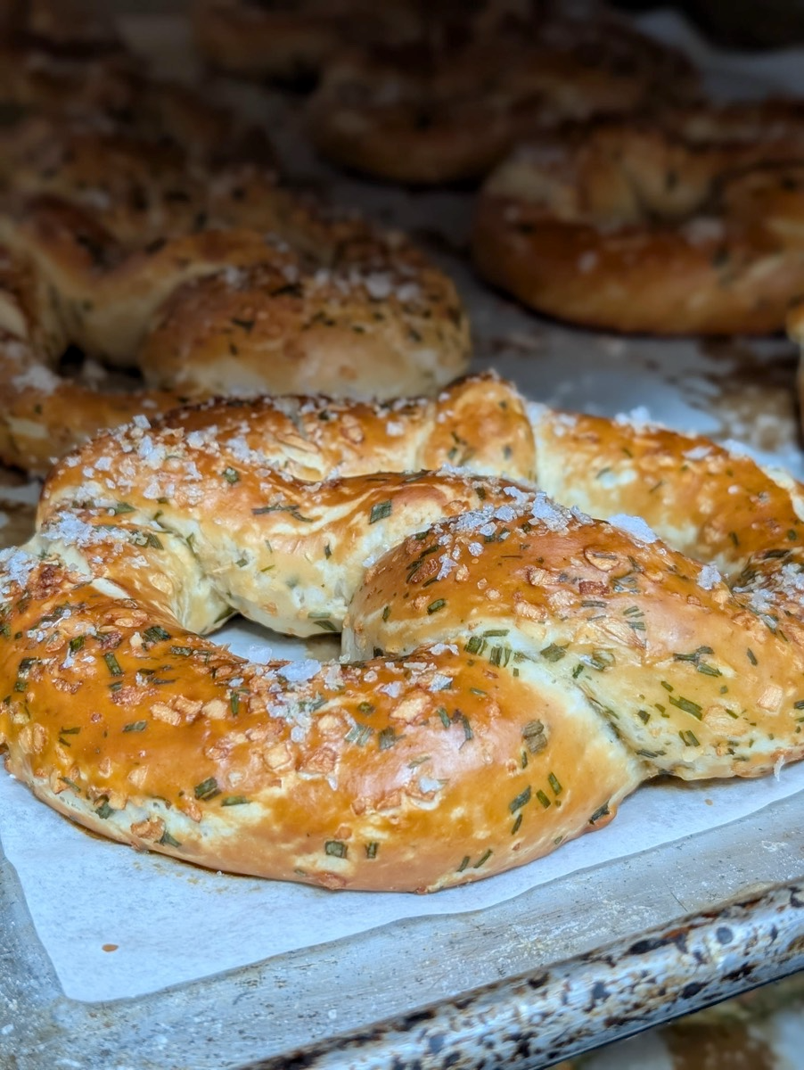 Fresh daily made pretzels in the wood fired oven. Authentic german-style soft pretzels and a staple of Alsace.