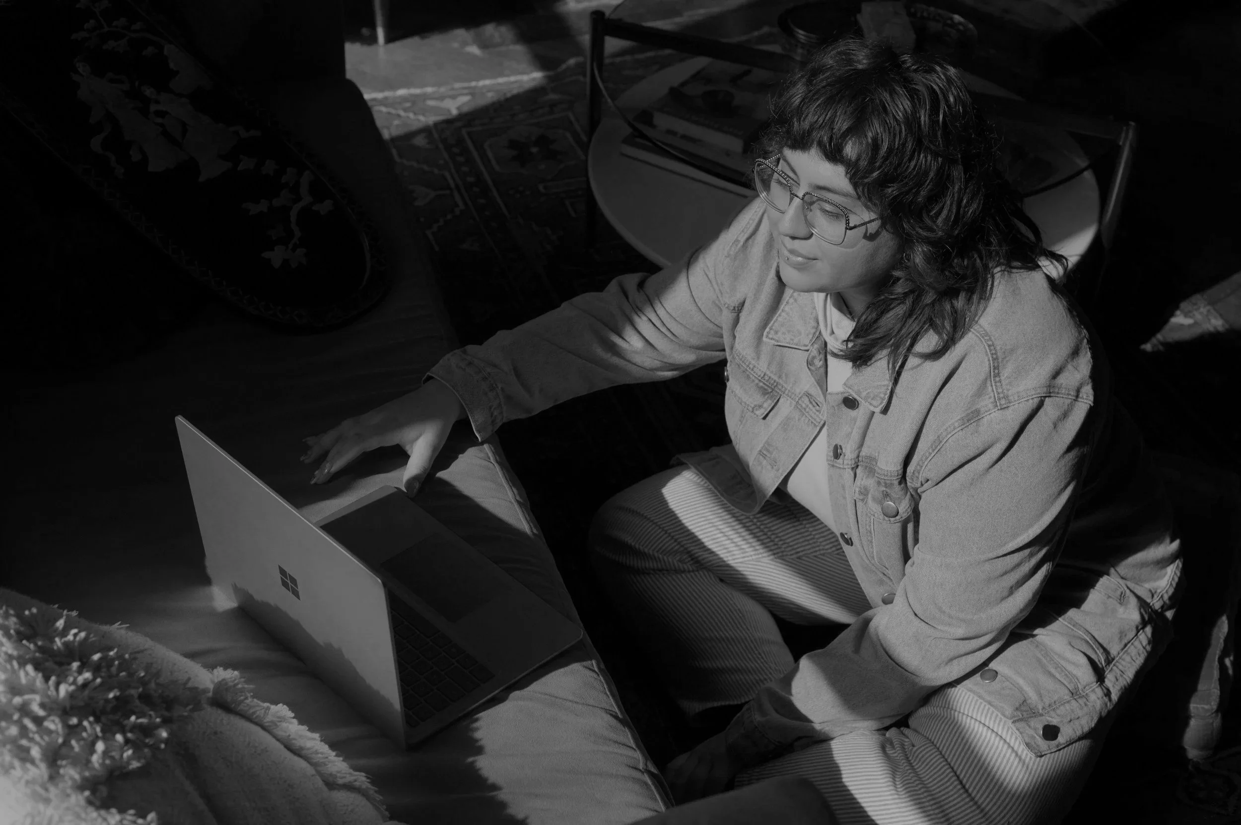 woman meeting with counselors on computer