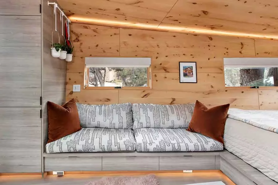 Comfortable sleeping area inside a Colorado mountain treehouse