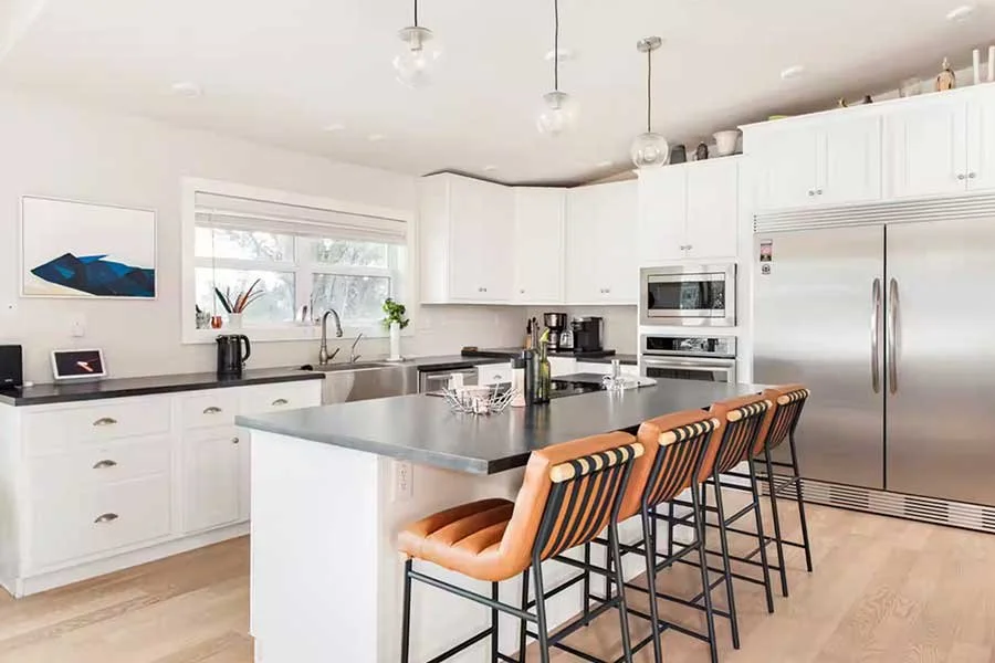 Spacious chef's kitchen with modern appliances at High West House in Carbondale