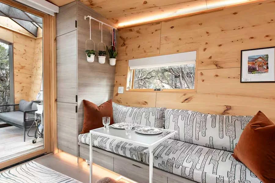 Inviting seating area inside a unique mountain treehouse getaway