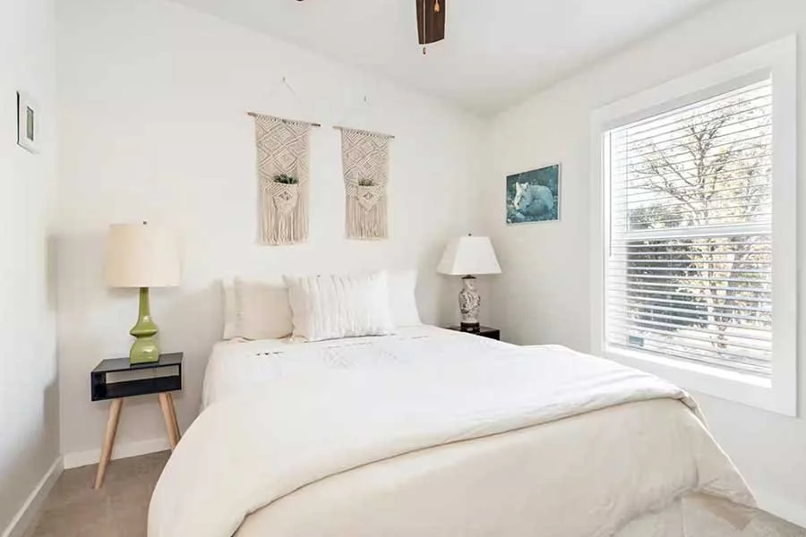 Luxury primary bedroom with mountain-inspired furnishings at High West House