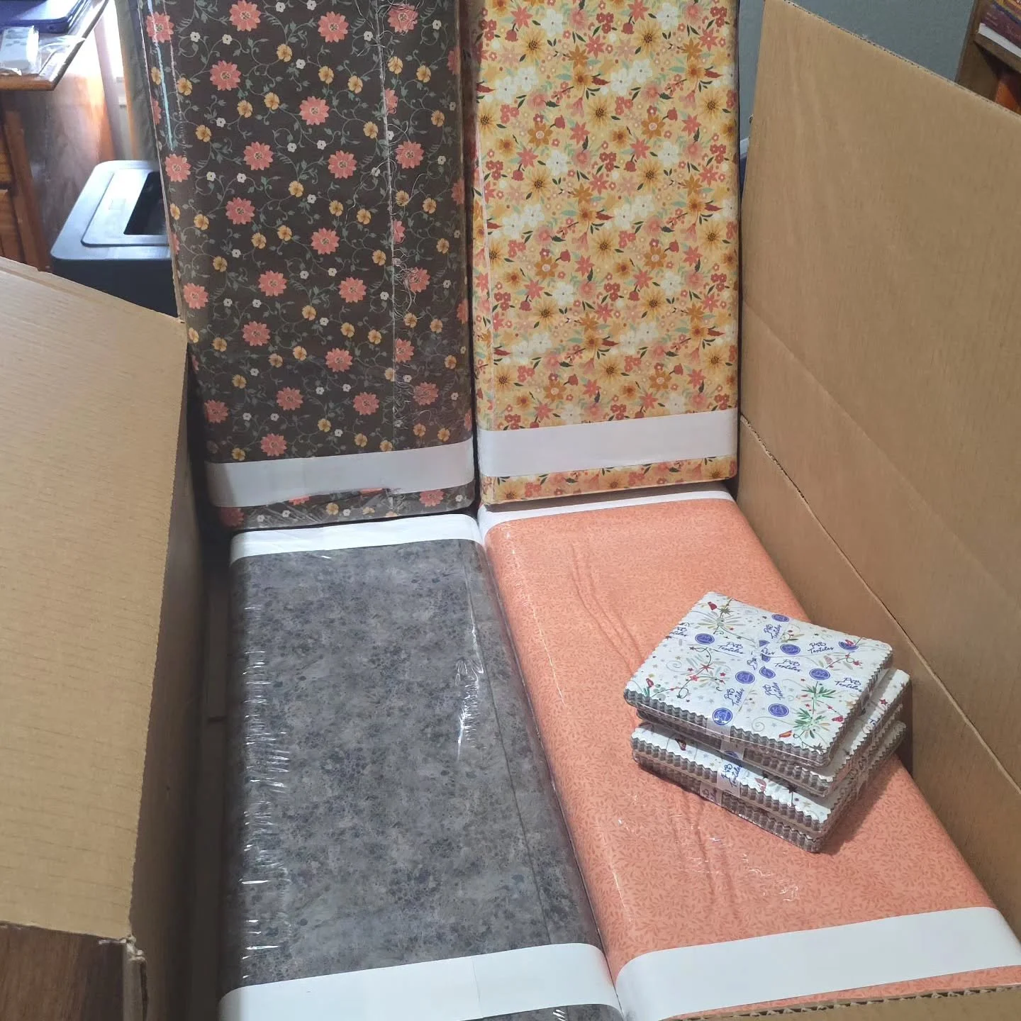 📦 New fabric delivery day!
Look what just arrived at Tootie&rsquo;s Quilt &amp; Fiber Studio! 🧵💕

I&rsquo;m loving these beautiful bolts from Maple &amp; Marigolds by Satin Moon Designs for Blank Quilting &mdash; the warm florals and colors are so