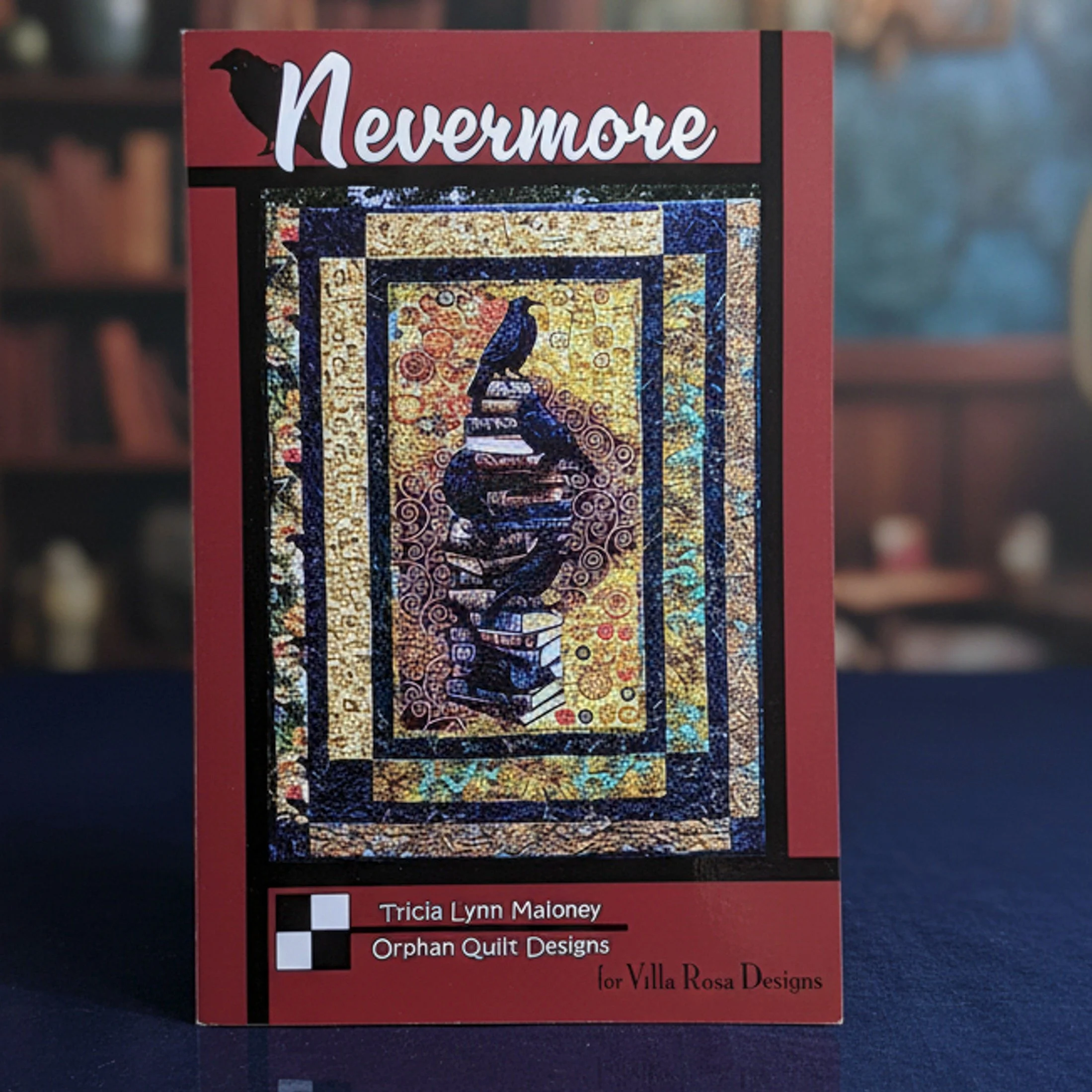 Say hello to Nevermore. 

This spooky little bundle has been sitting on my cutting table and I can't stop smiling at it. 

Haunted houses, jack-o'-lanterns, bats, ghosts.Everything you need for a Halloween project that feels a little vintage and a li