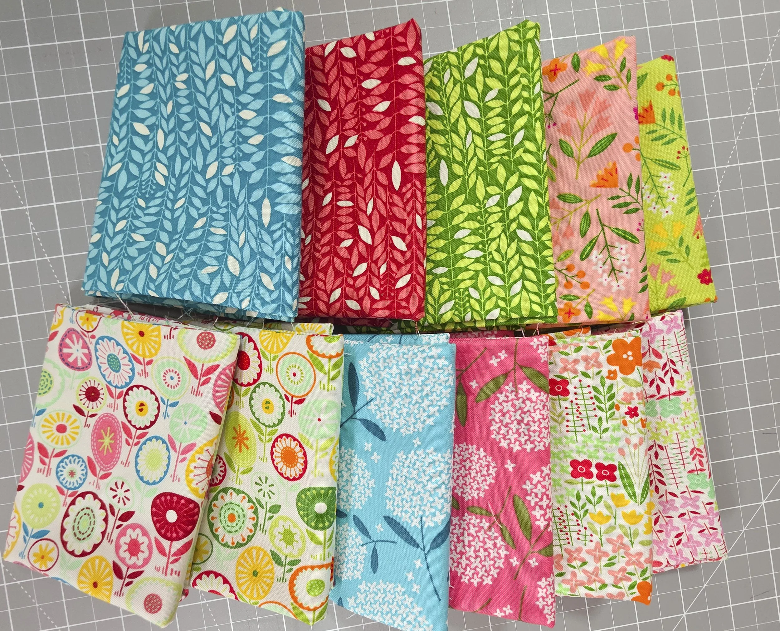 11 pc Blooming Clr fabric bundle flat.jpg