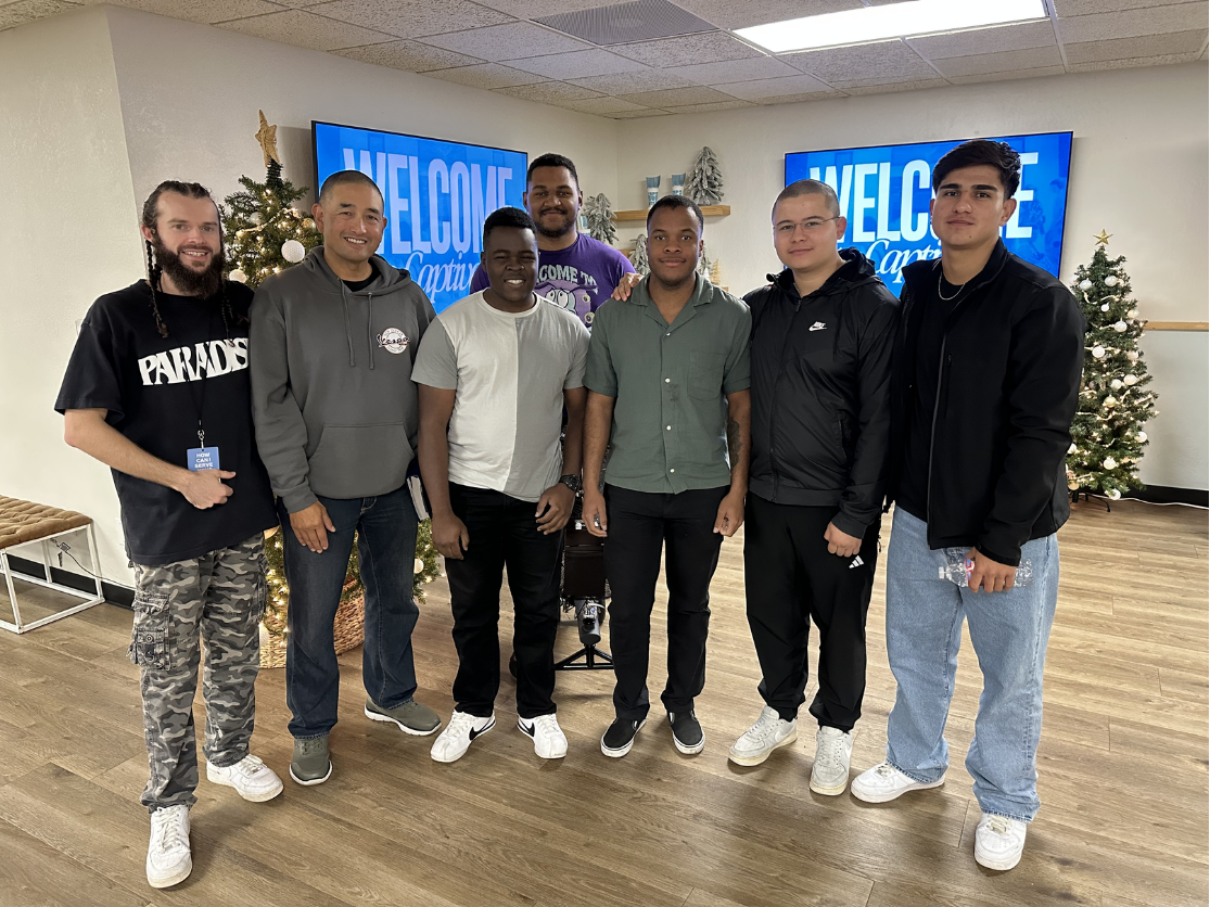 Michael Morabe with a group of men he's transported to church.