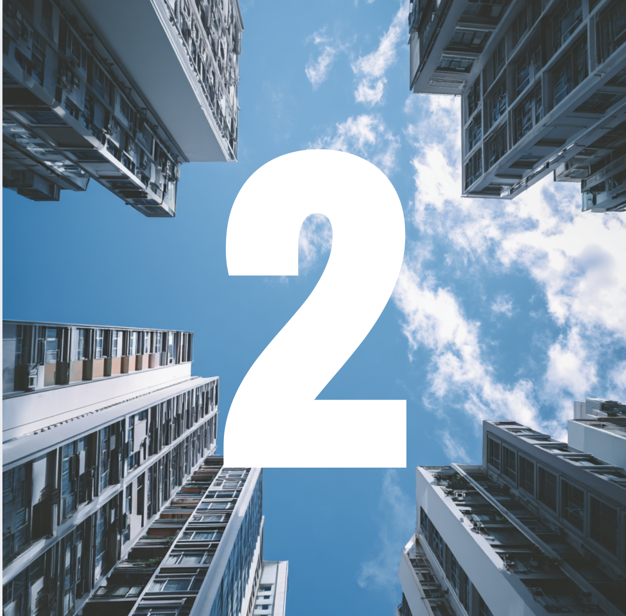 Tall apartment buildings viewed from the ground looking up at a bright blue sky with some clouds, with a large white number 2 overlaid.