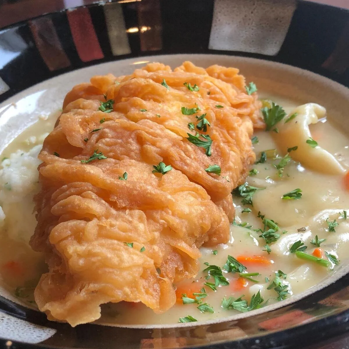 Farmers Gastropub’s ultimate comfort food. Fried PVP chicken and dumplings, mashed potatoes, and chicken gravy.