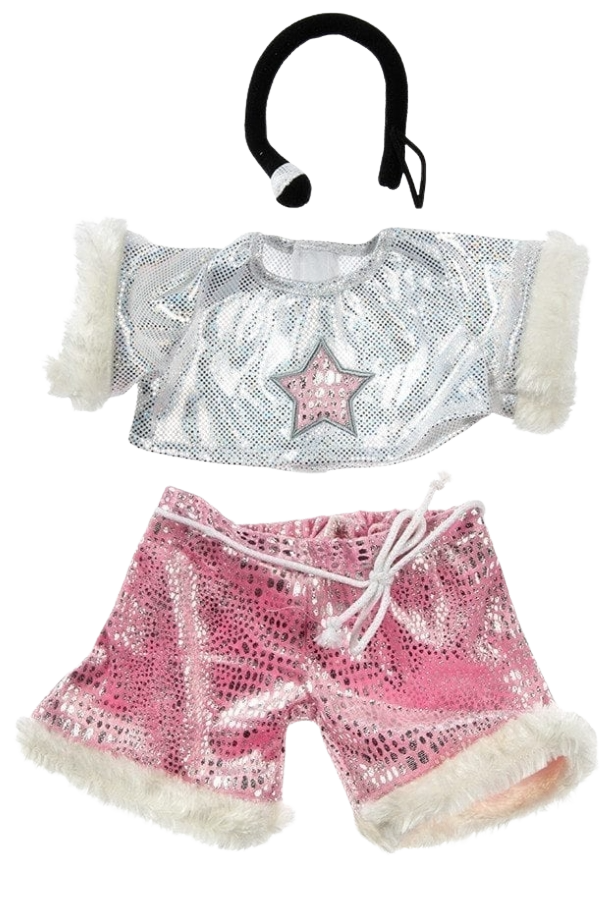 A set of children's clothing accessories, including a silver cape with a pink star, pink sequin shorts with a white drawstring, and a black headband with a white pompom.