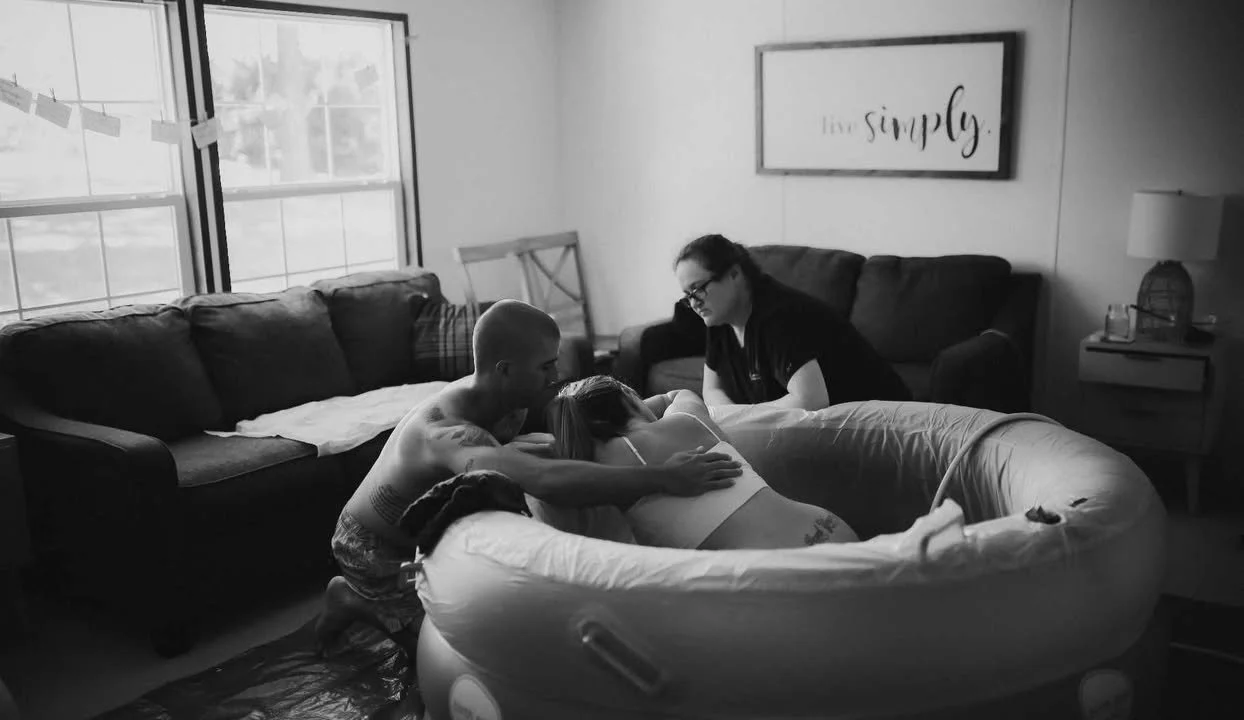 woman in birth tub in labor