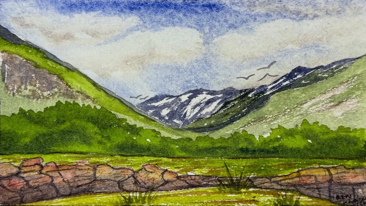 Watercolor landscape of green mountains with snowy peaks, blue sky with clouds, and birds flying.