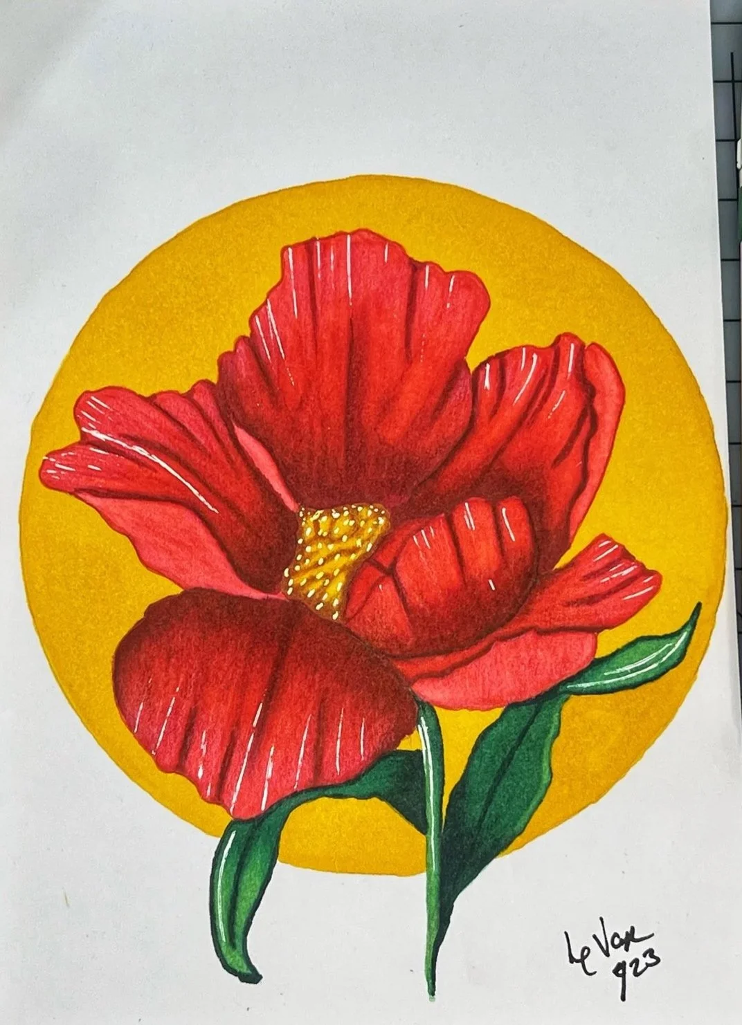 A detailed colored pencil drawing of a red poppy flower with green leaves, set against a yellow circular background. Signed by the artist 'Le Van 923' at the bottom right.