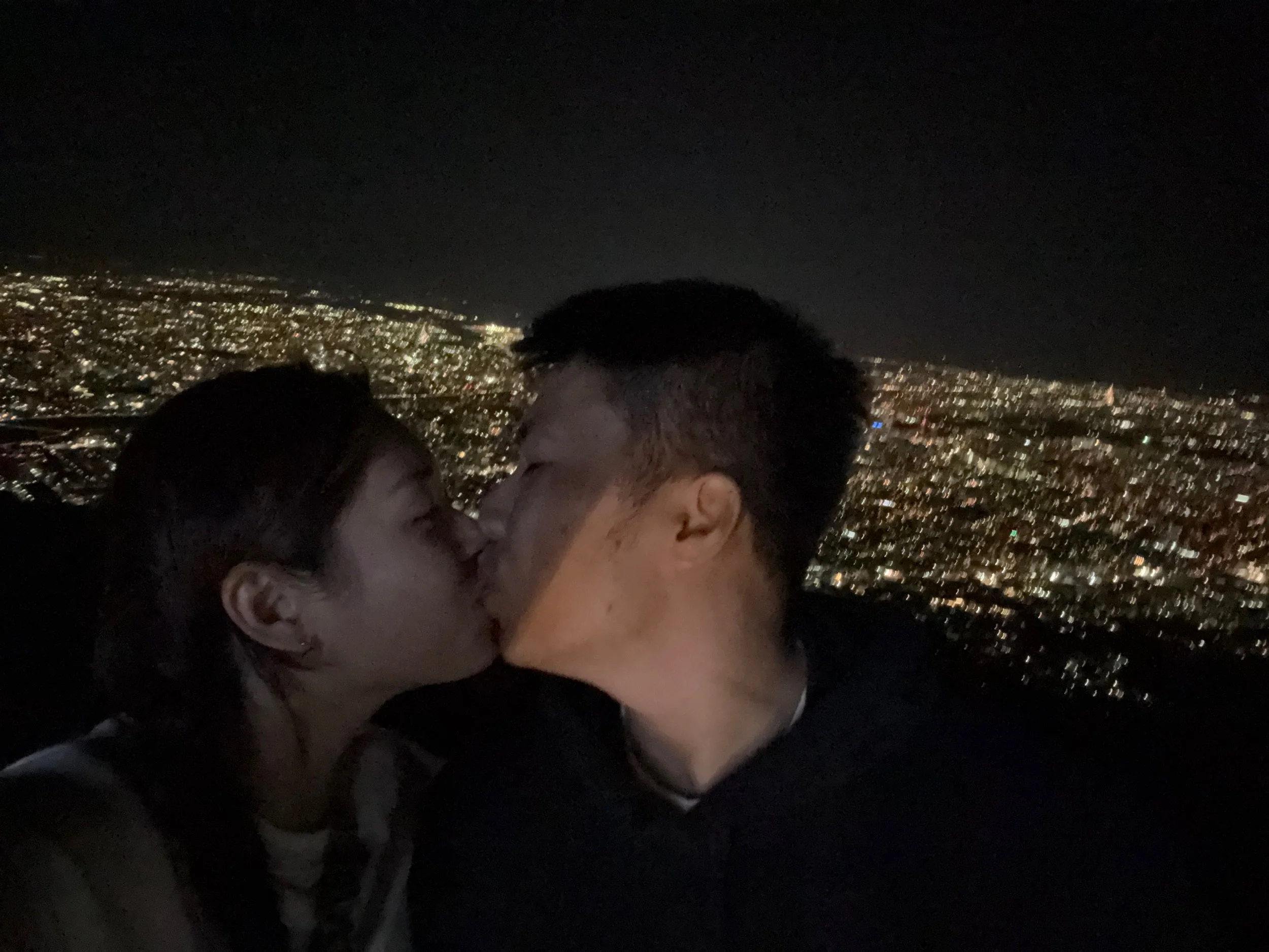 A cheeky little kissy photo in Hokkaido, taken after a cable car ride up for the night view. Romantic behaviour, clearly. 🙈