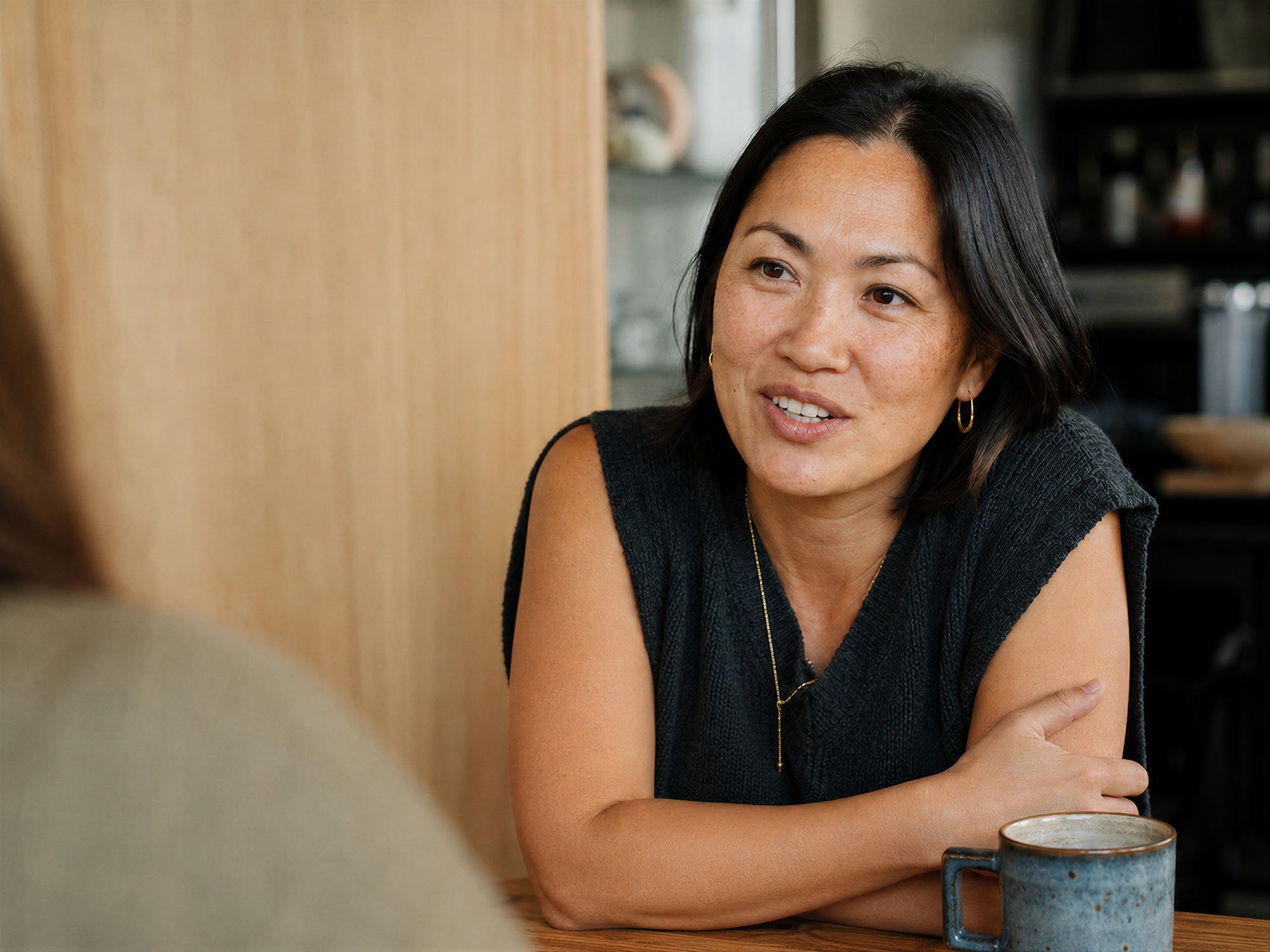 A woman engaged in a supportive healthcare consultation. We provide clear, practical advice and education to help you make informed decisions about your care.