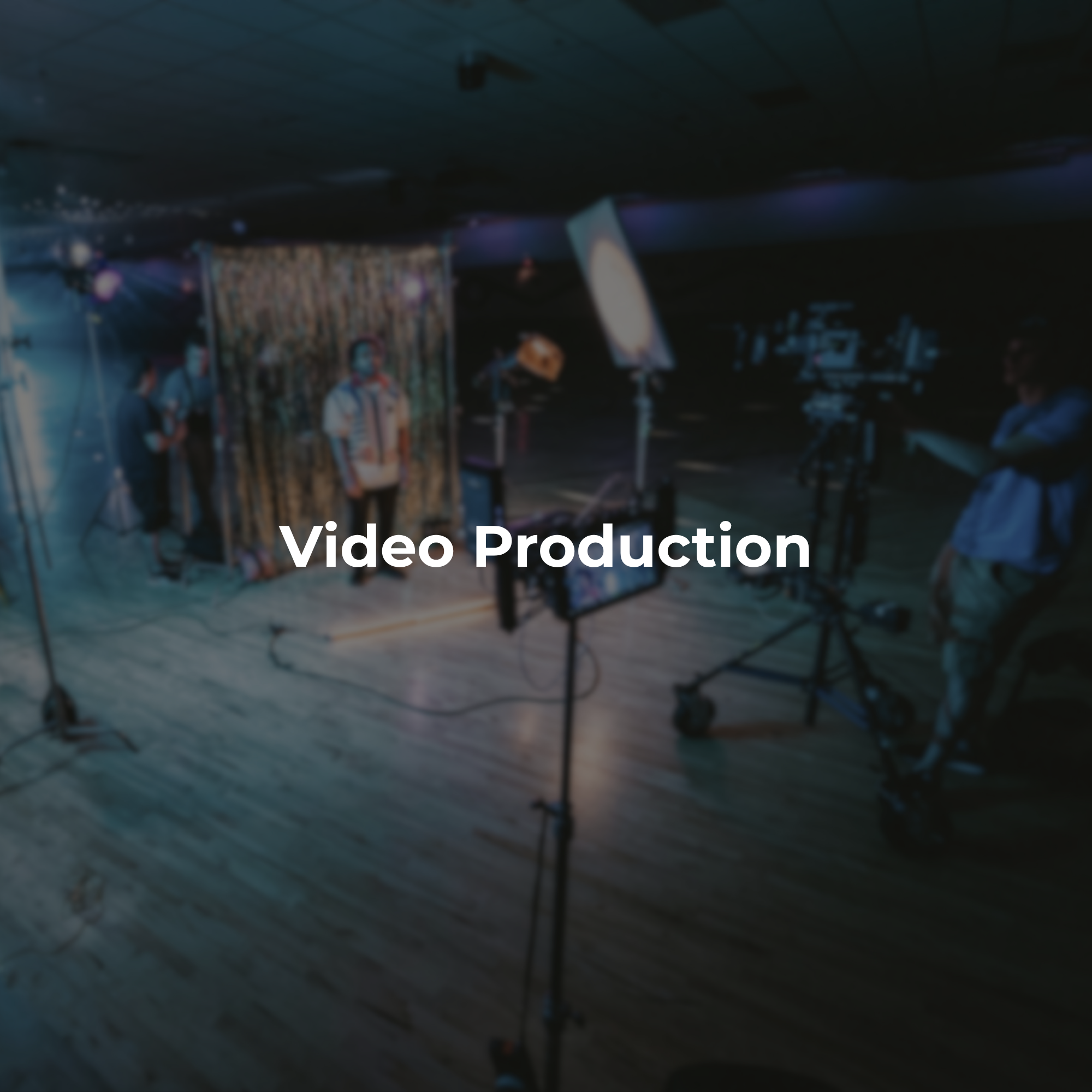 Behind-the-scenes video production setup with professional camera and lighting equipment during a film shoot.