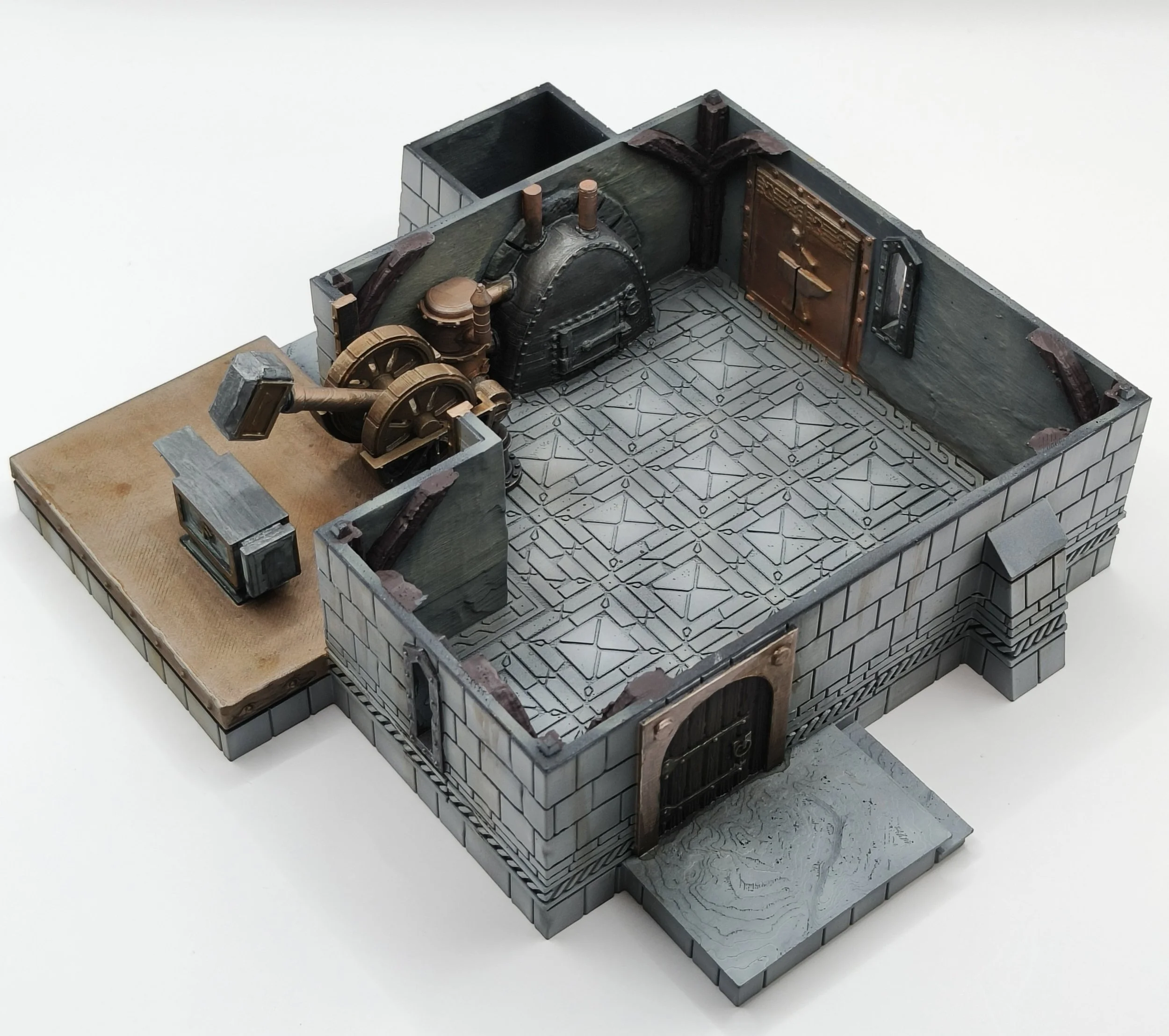 A miniature model of a medieval-style furnace with detailed textures and metallic parts, surrounded by stone brick walls, on a white background.