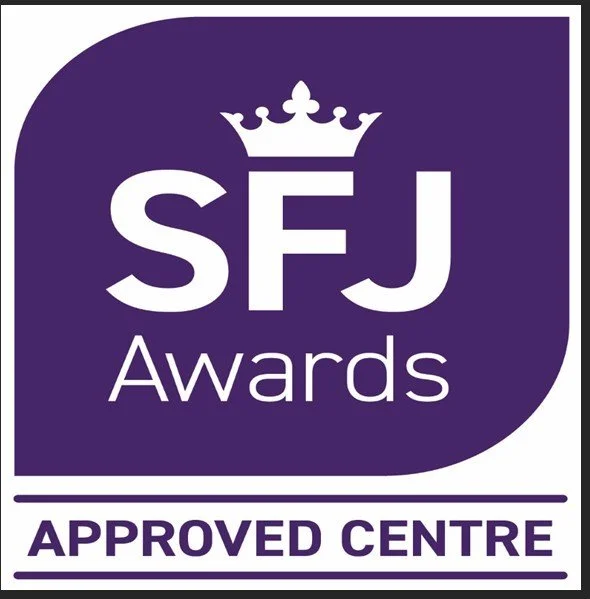 Purple square logo with a white crown, the letters 'SFJ' in large font, and the words 'Awards' and 'Approved Centre'.