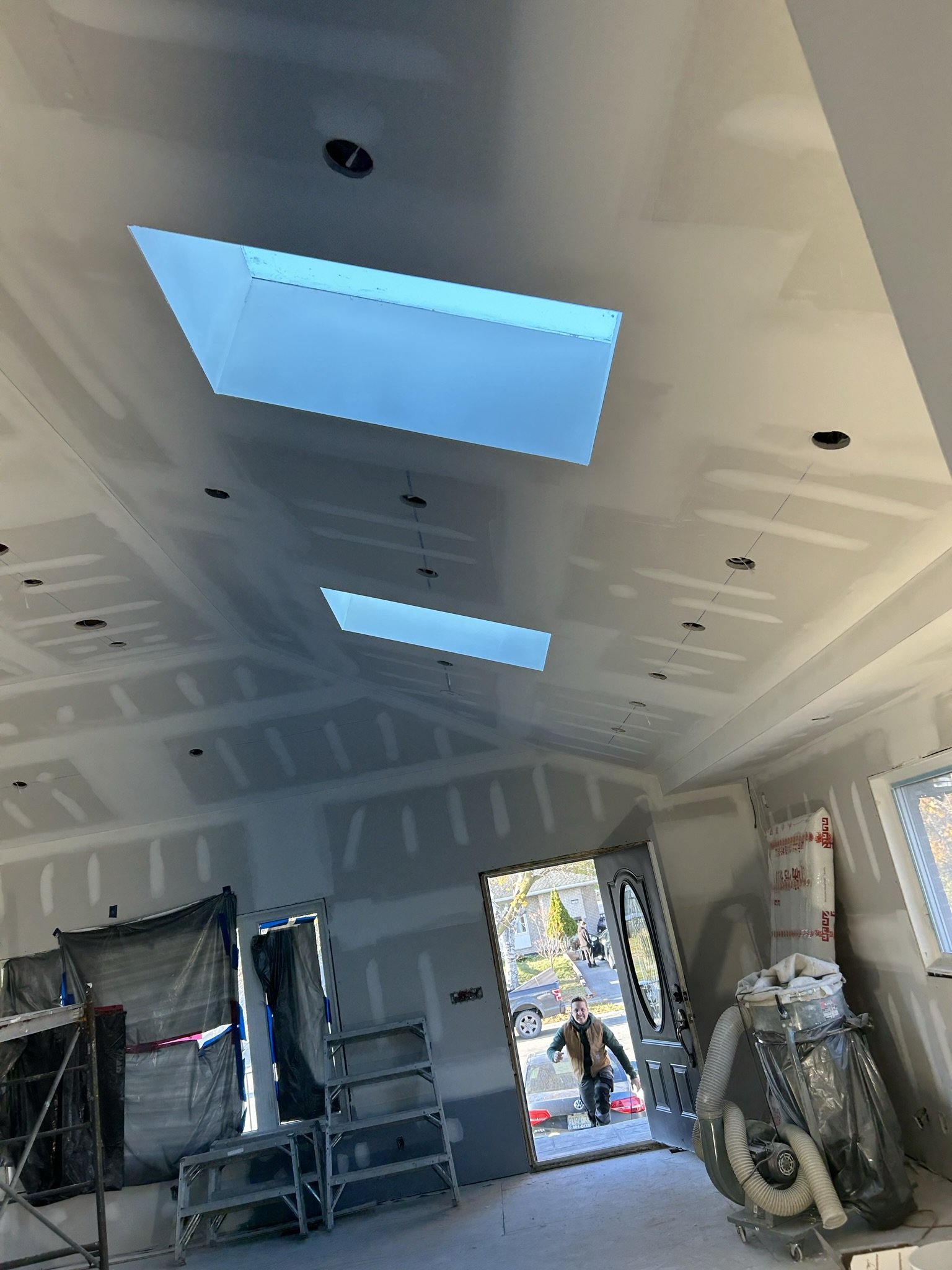 Custom home drywall finishing and seam taping completed in Oakville.