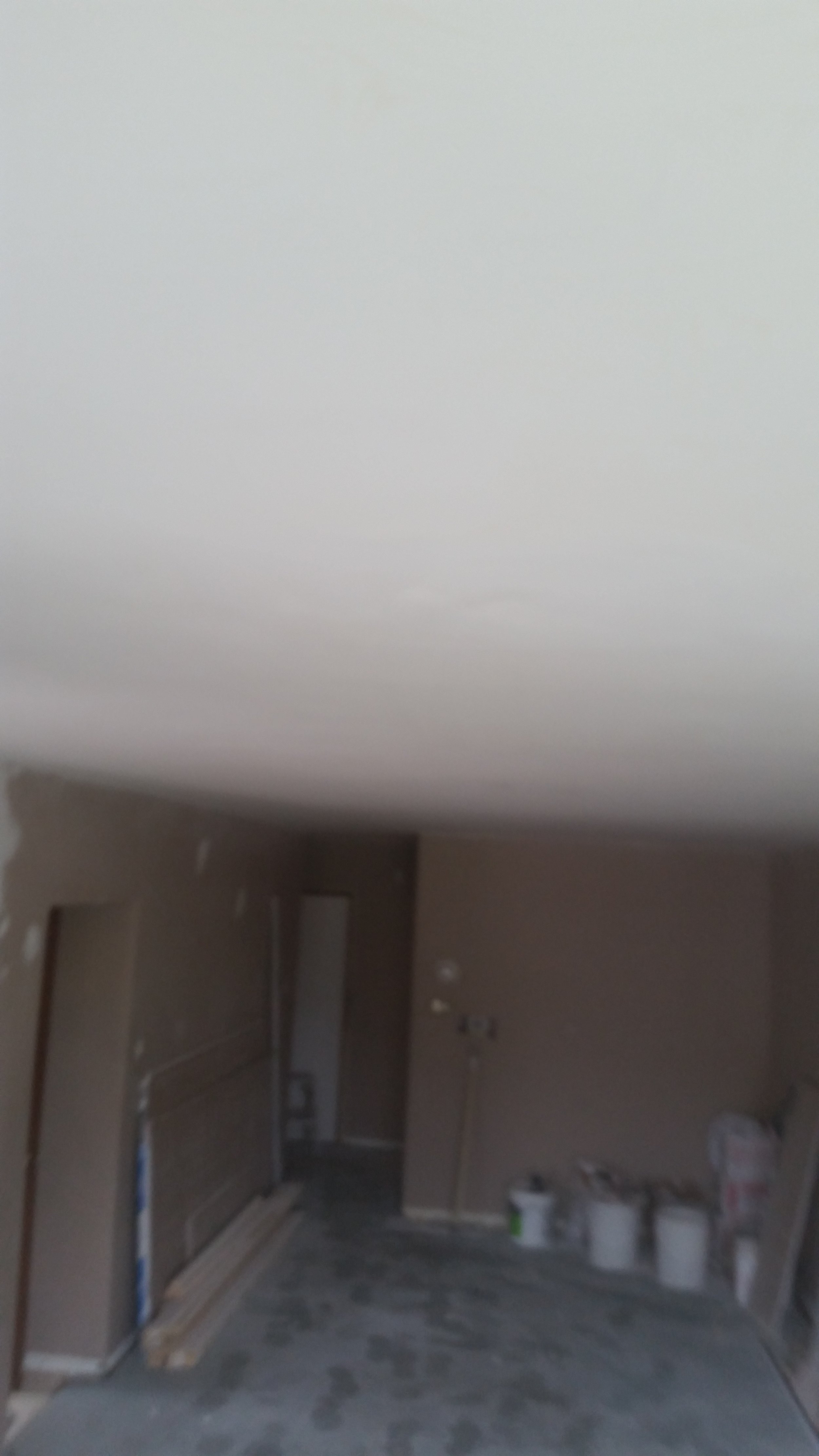 Interior drywall finishing and ceiling preparation project in Mississauga.