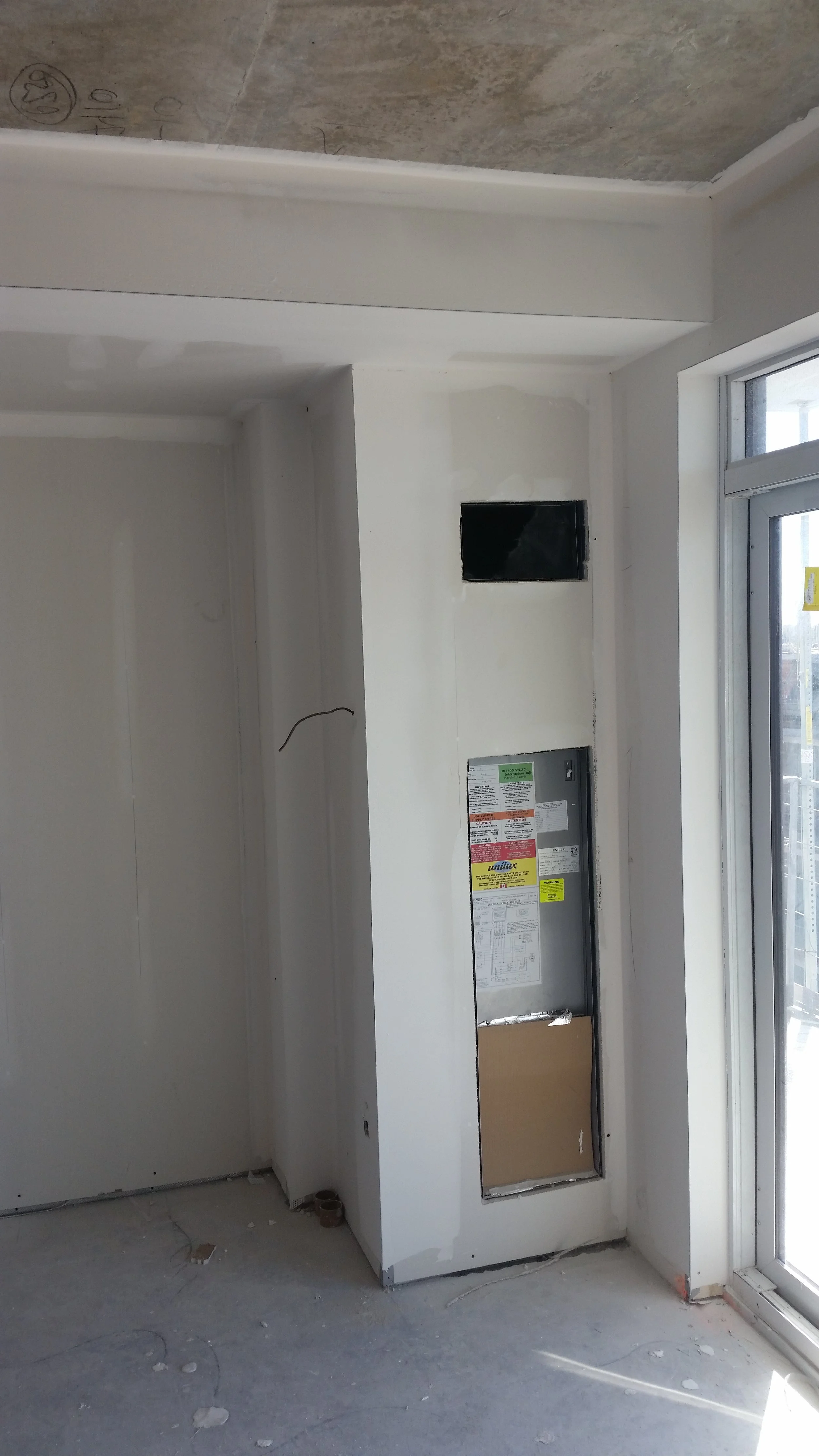 Interior drywall installation and plastering project in Etobicoke by Ontario Drywall Finishes.