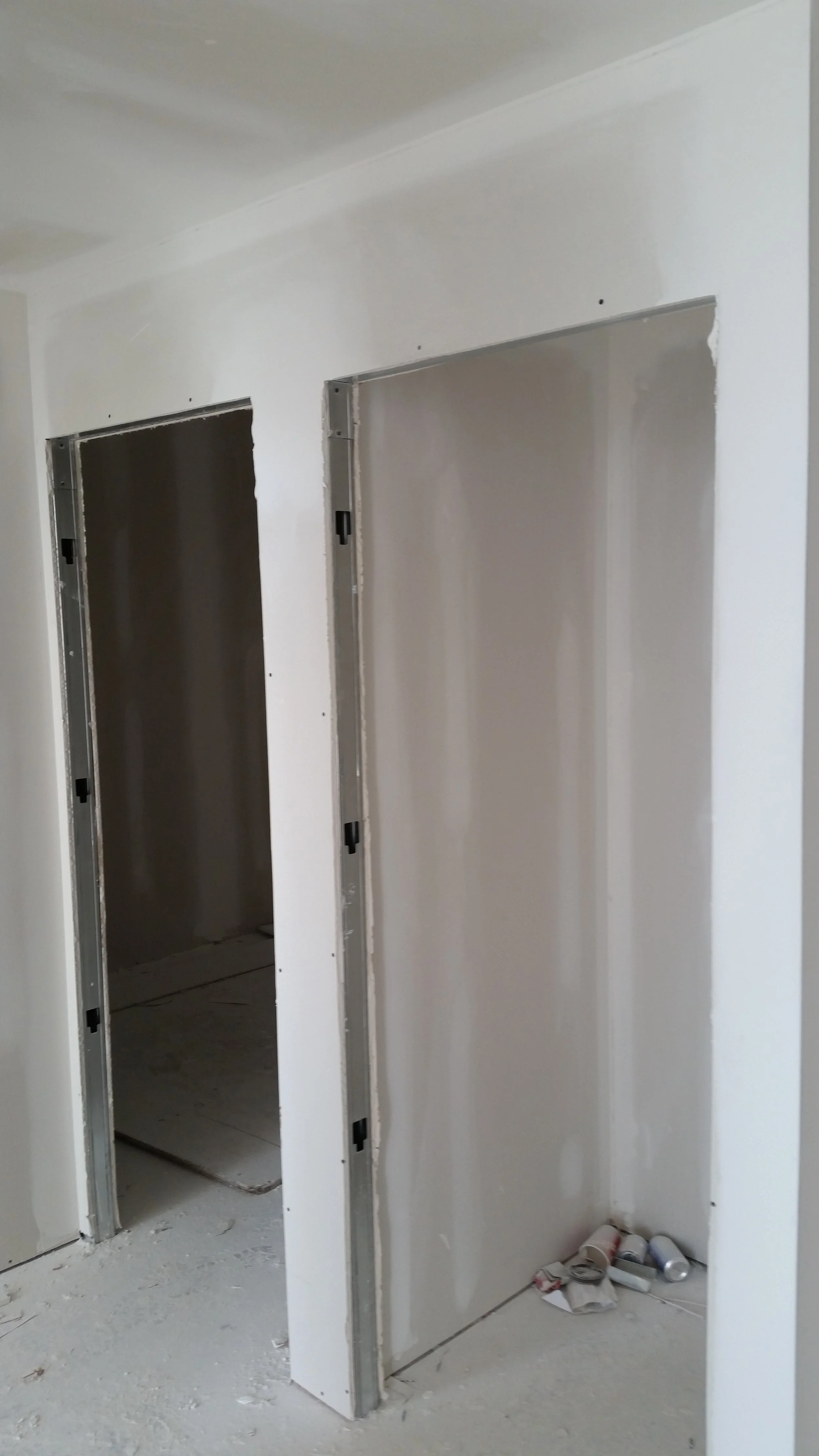 Interior walls under construction with metal framing for new doors, in Etobicoke.