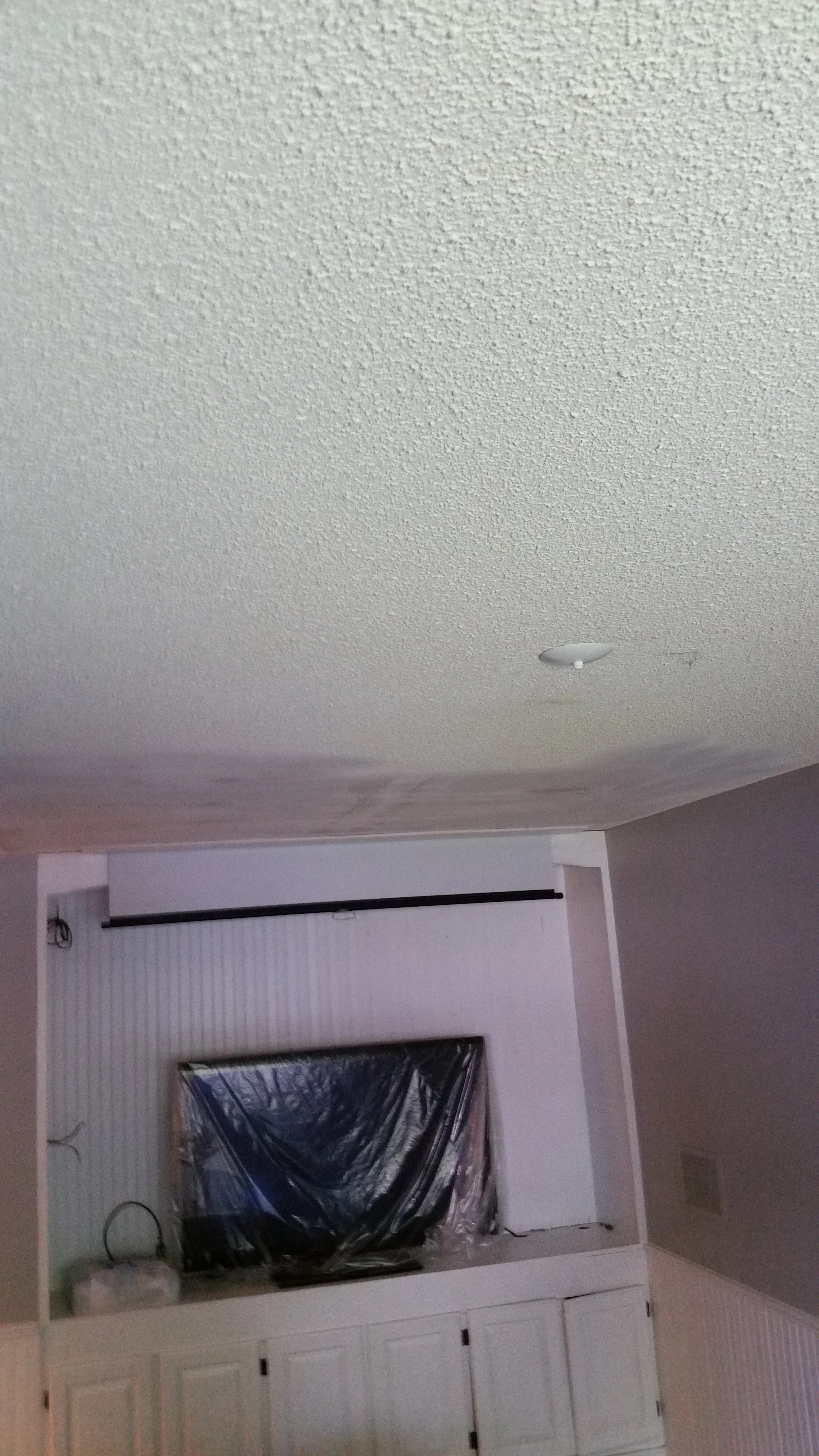 Drywall repair, wall patching, and ceiling finishing project completed in Toronto.