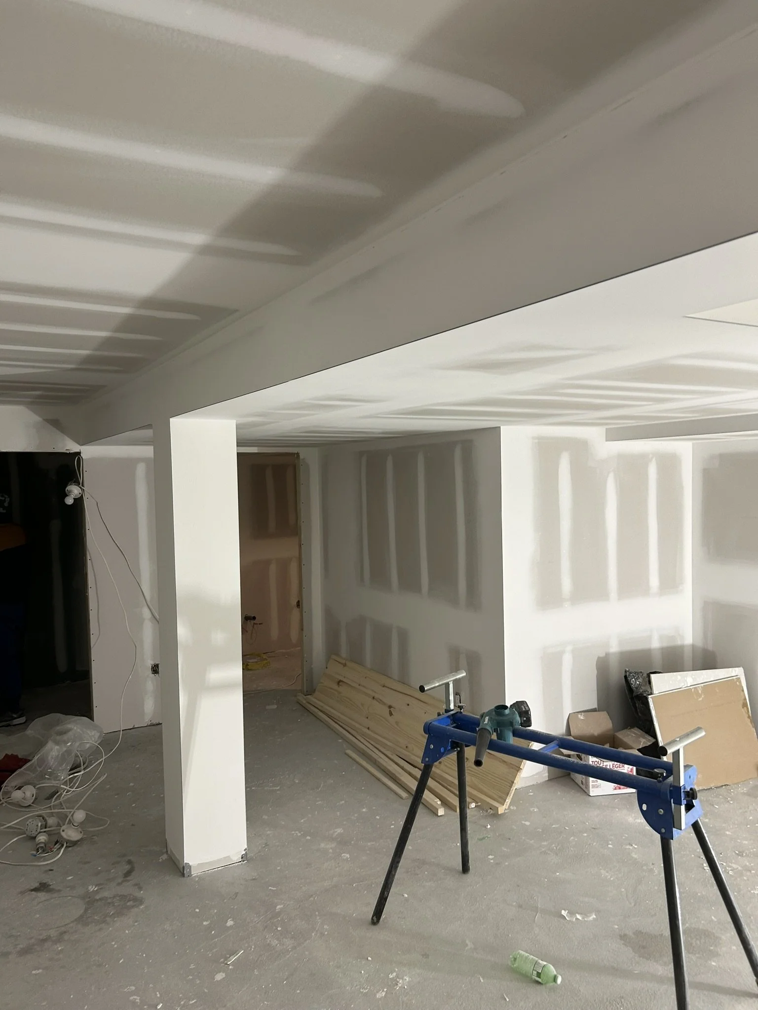Residential drywall installation and taping project in Oakville.