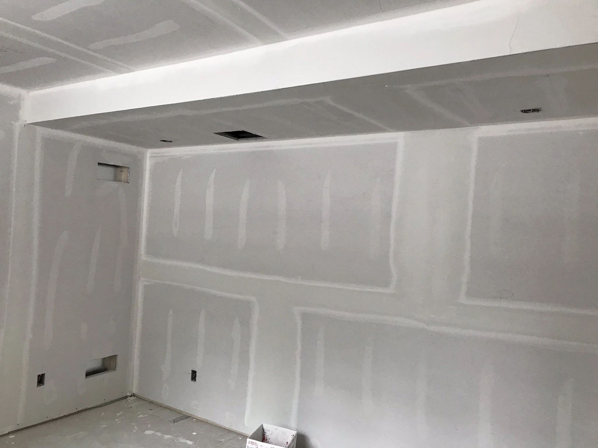 Drywall installation and finishing completed in a residential closet renovation in Toronto.