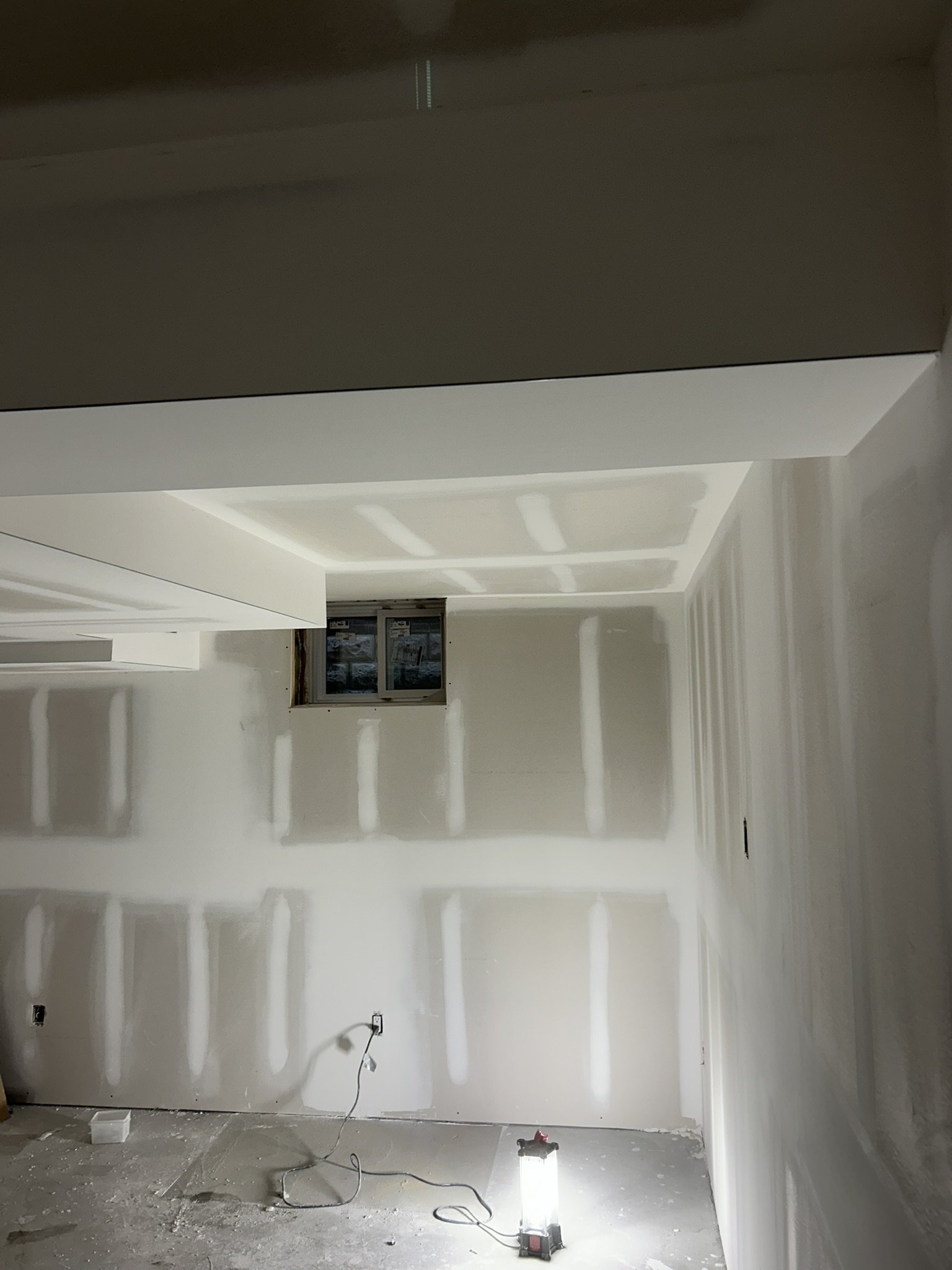 Basement drywall installation and finishing project in Etobicoke.