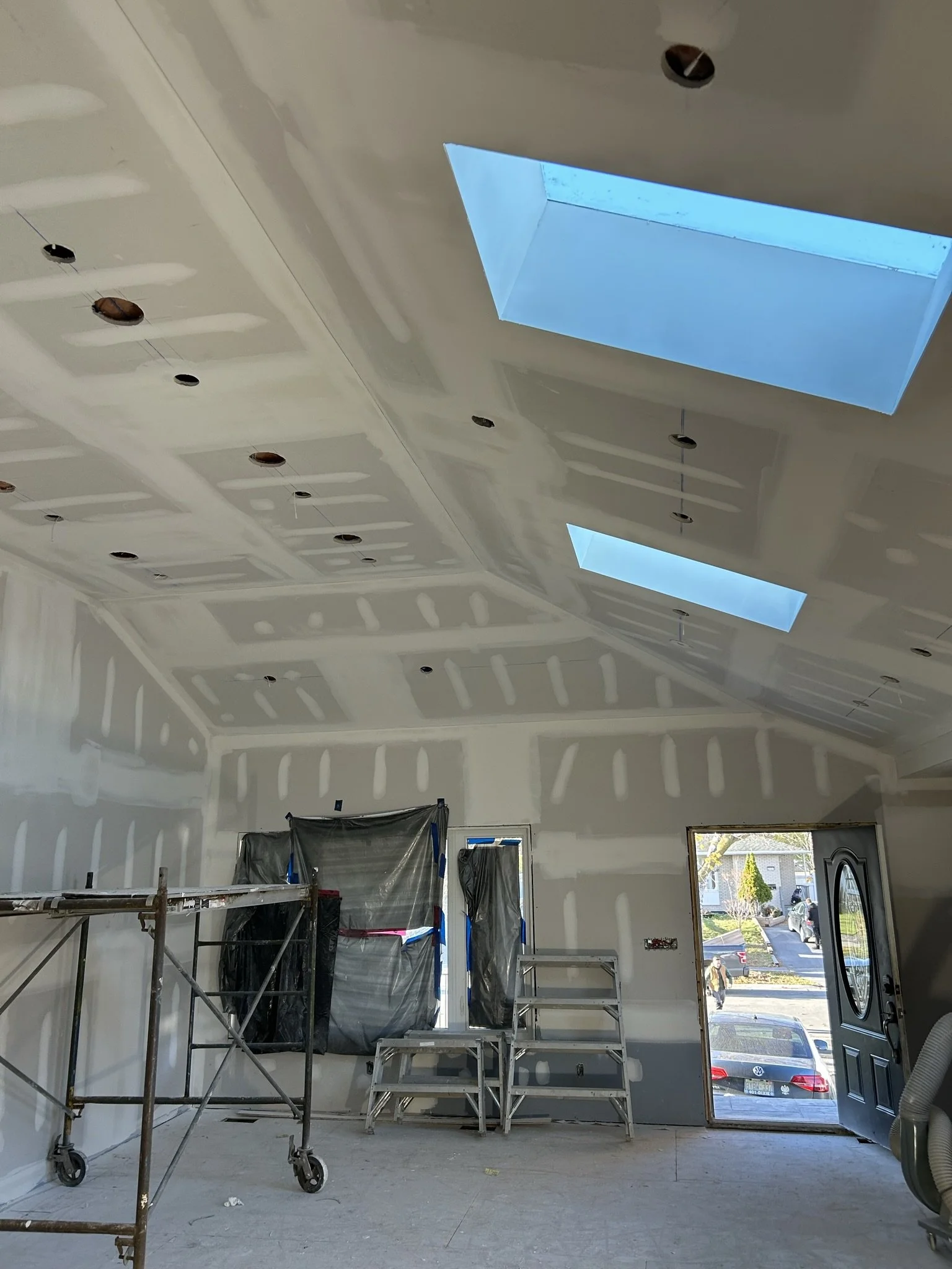 Custom home drywall taping and plaster finishing project in Oakville.