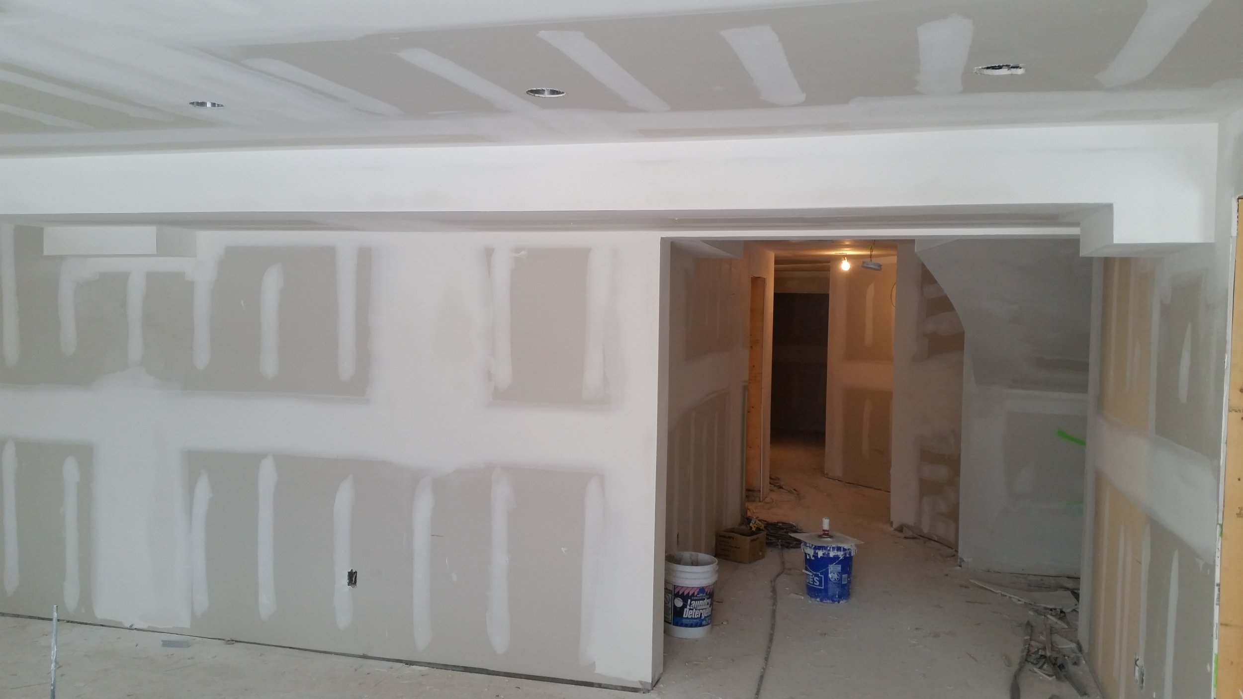 Interior drywall finishing and ceiling preparation project in Mississauga.