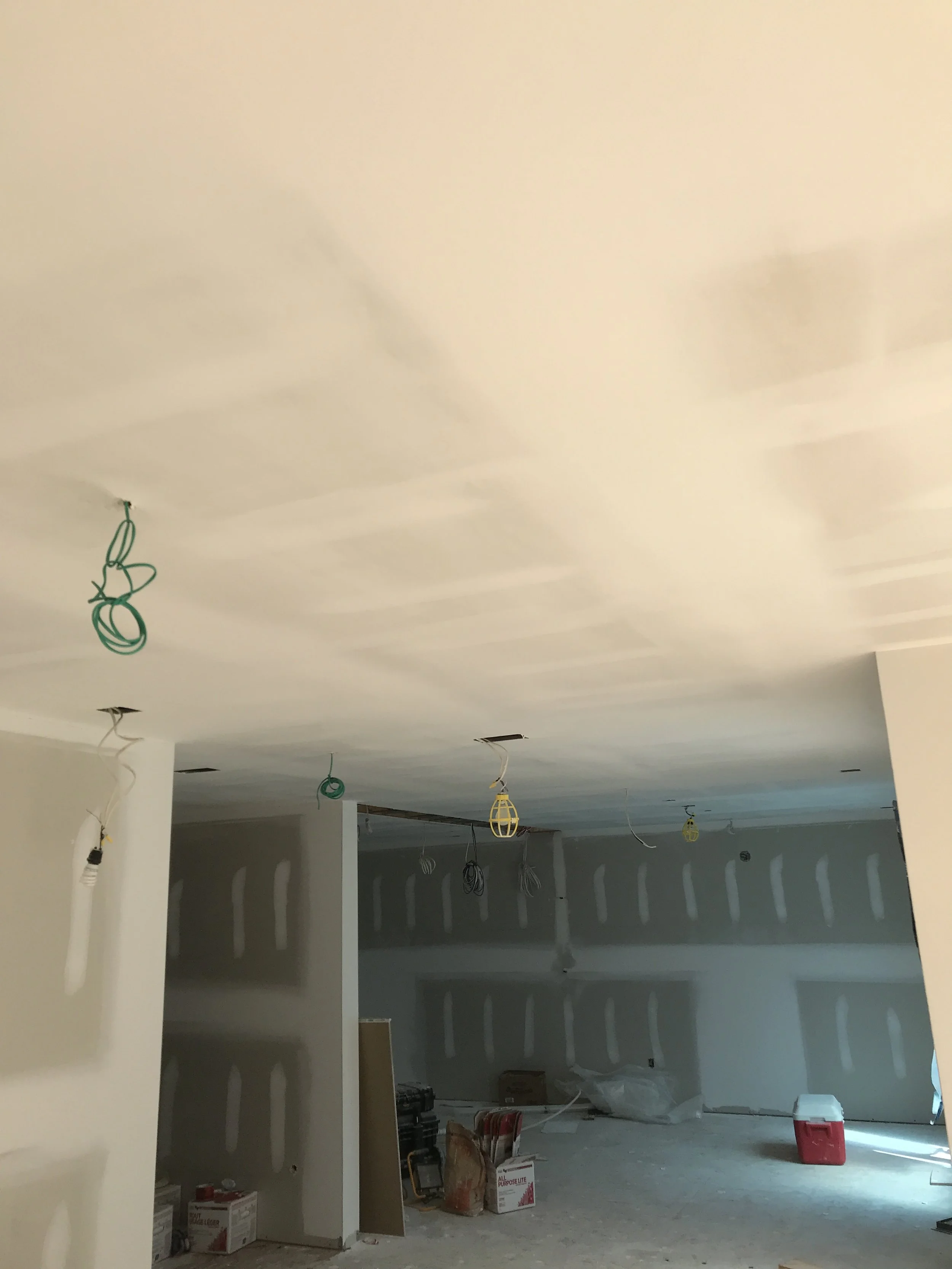 Residential drywall installation and plastering service during a renovation in Mississauga.