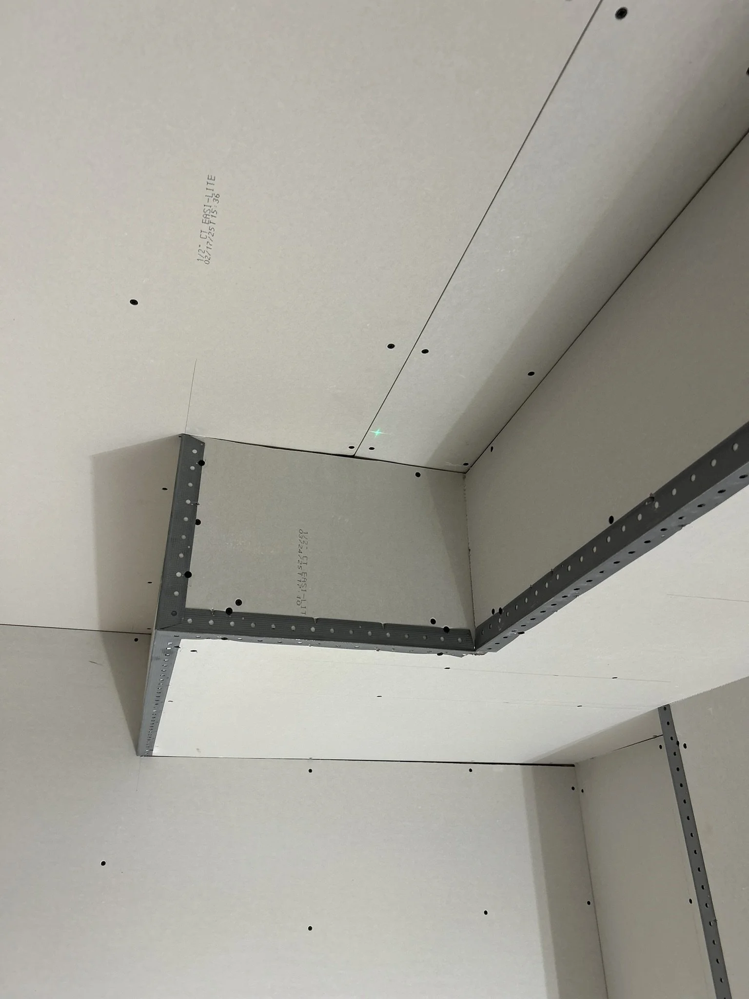 Ceiling drywall installation and finishing project in Toronto.