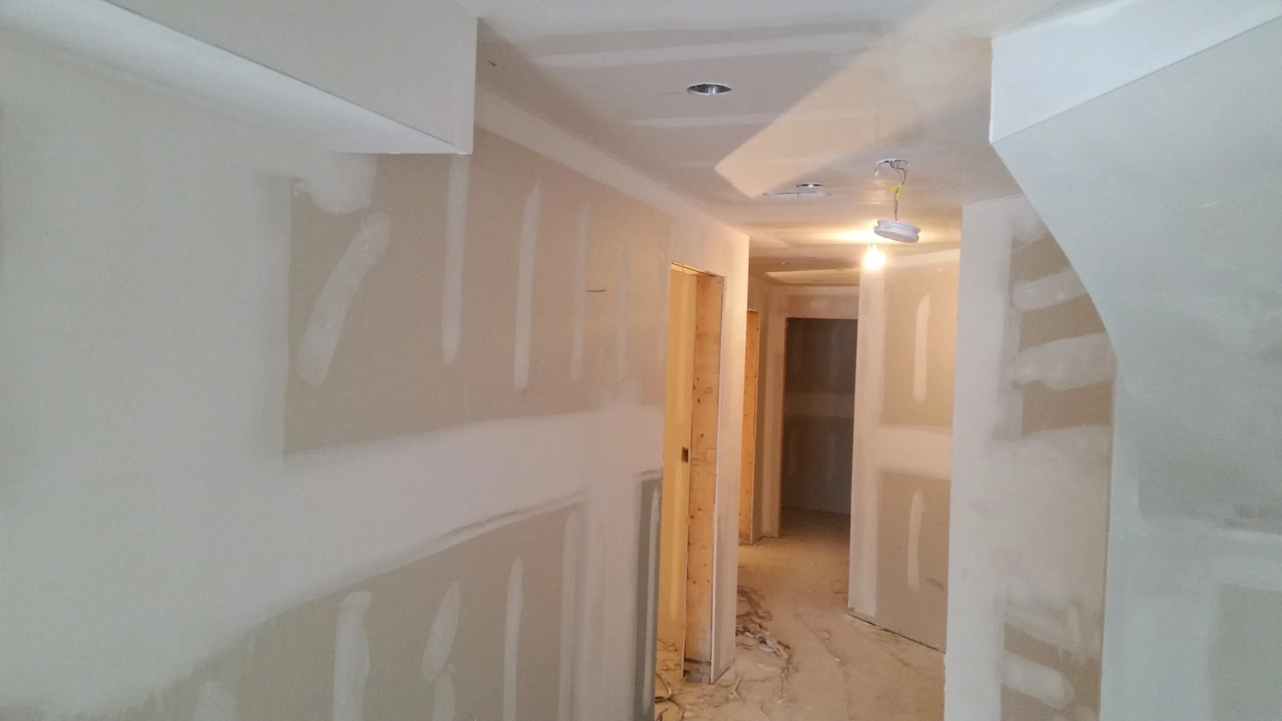 Residential drywall installation and plastering project in Toronto.